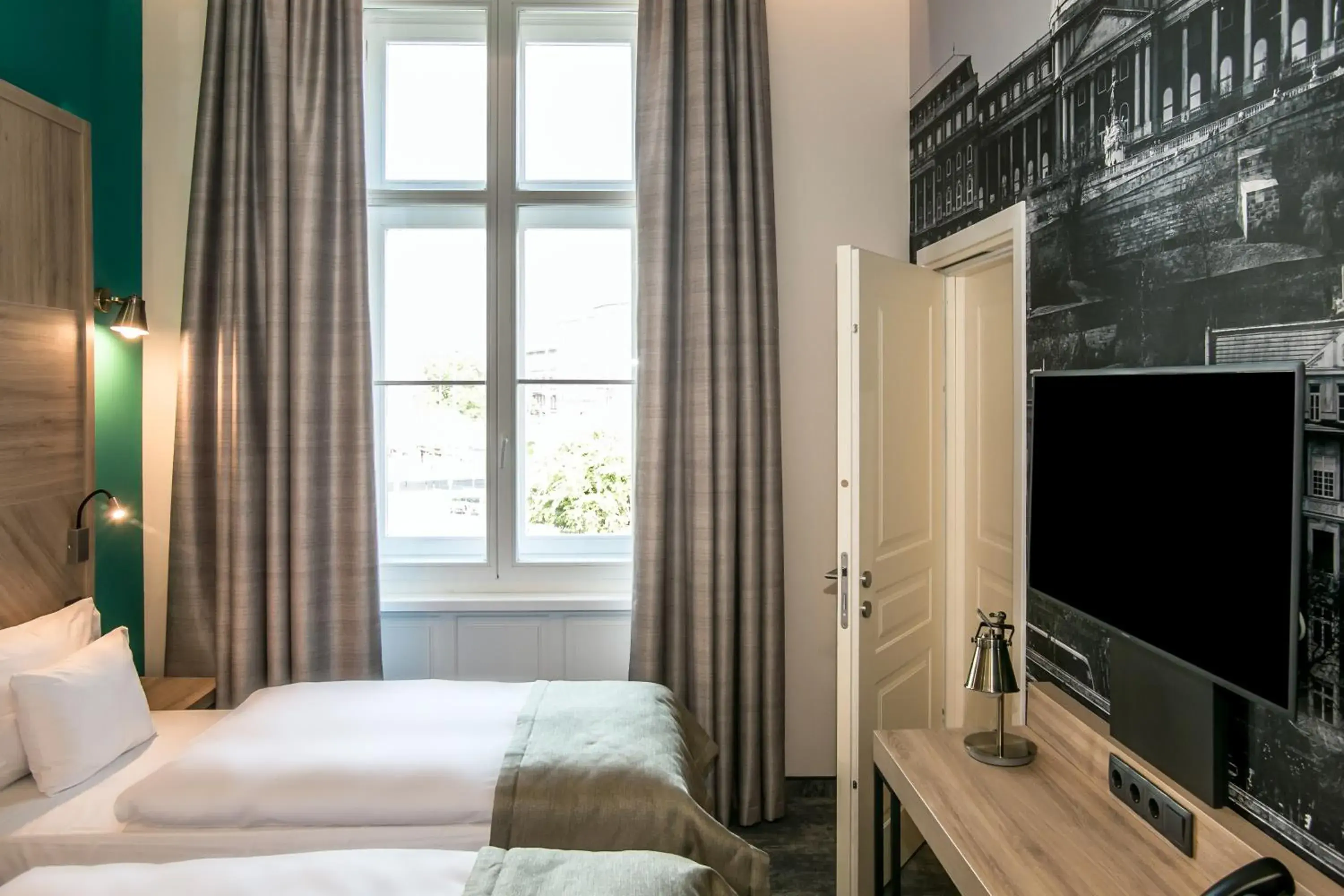 Communal lounge/ TV room, Bed in T62 Hotel Communal lounge/ TV room, Bed in T62 Hotel