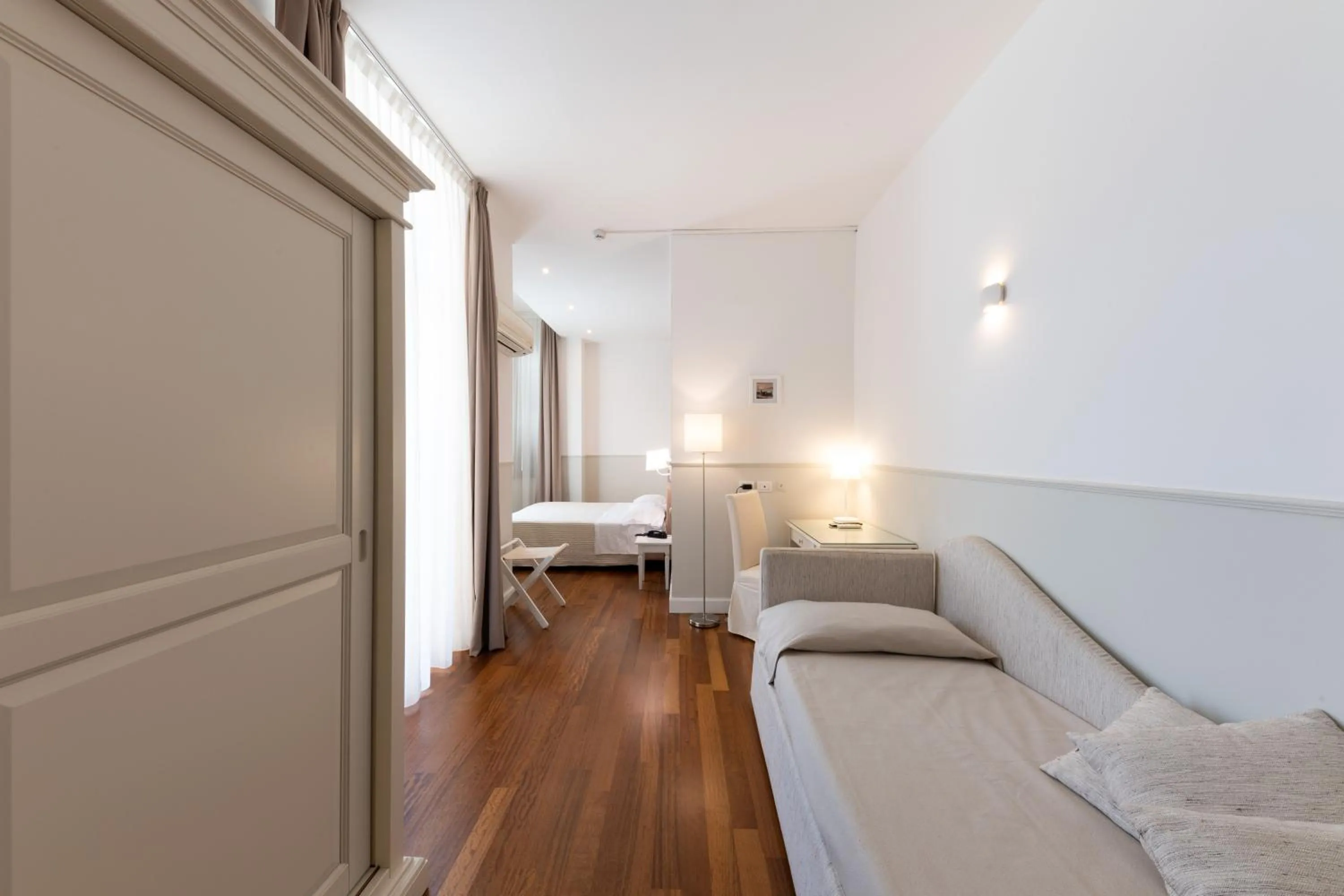 Bed in Miramare Hotel