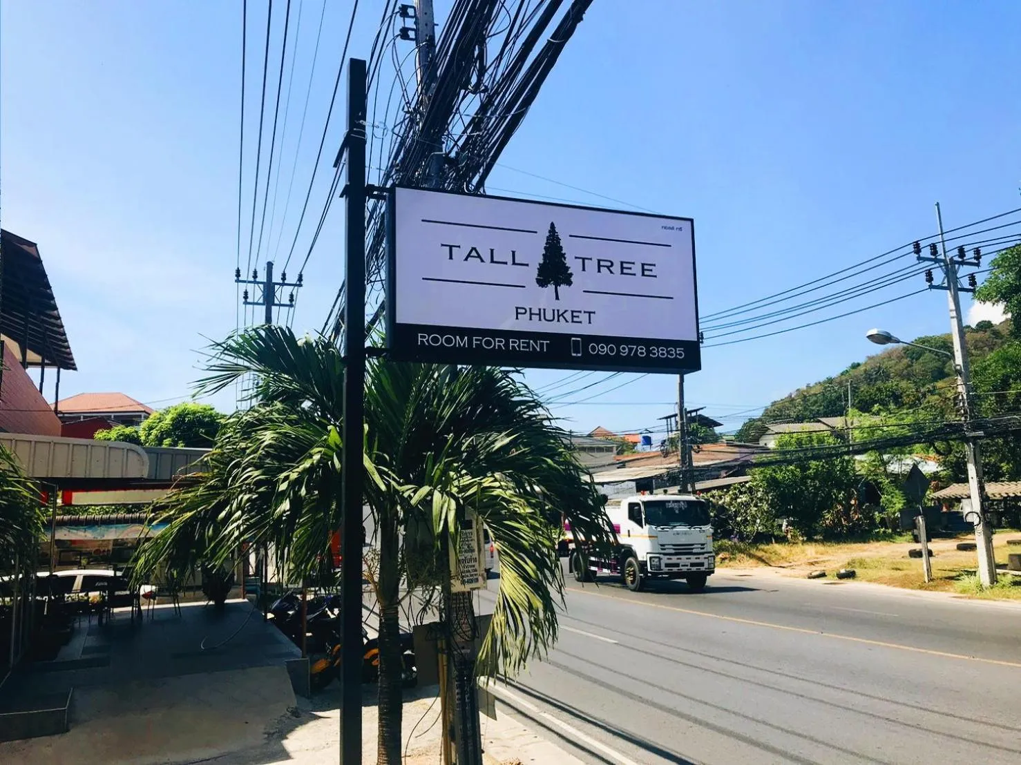 Property logo or sign in Tall Tree Kata Phuket