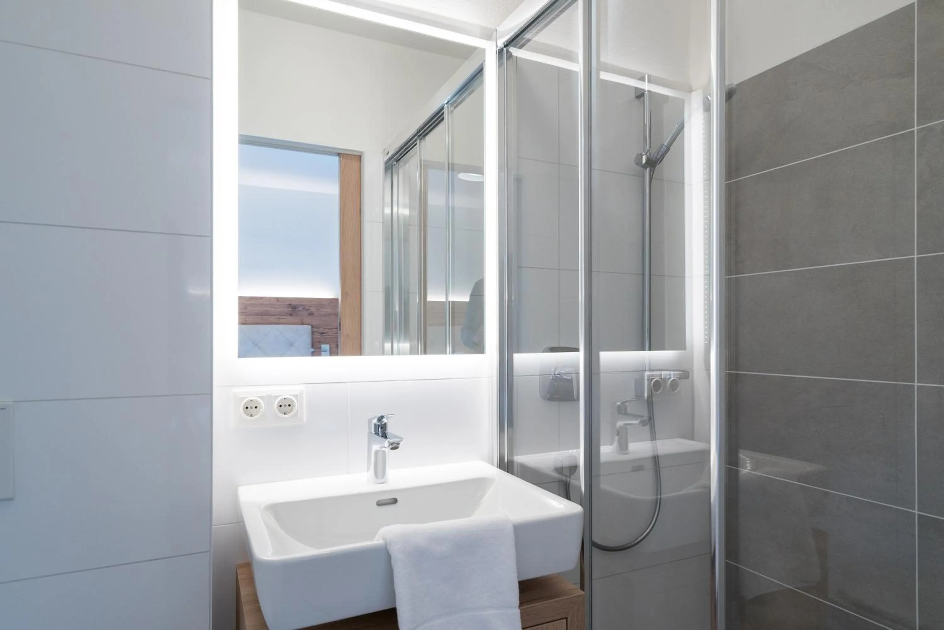 Bathroom in Village Park Suites
