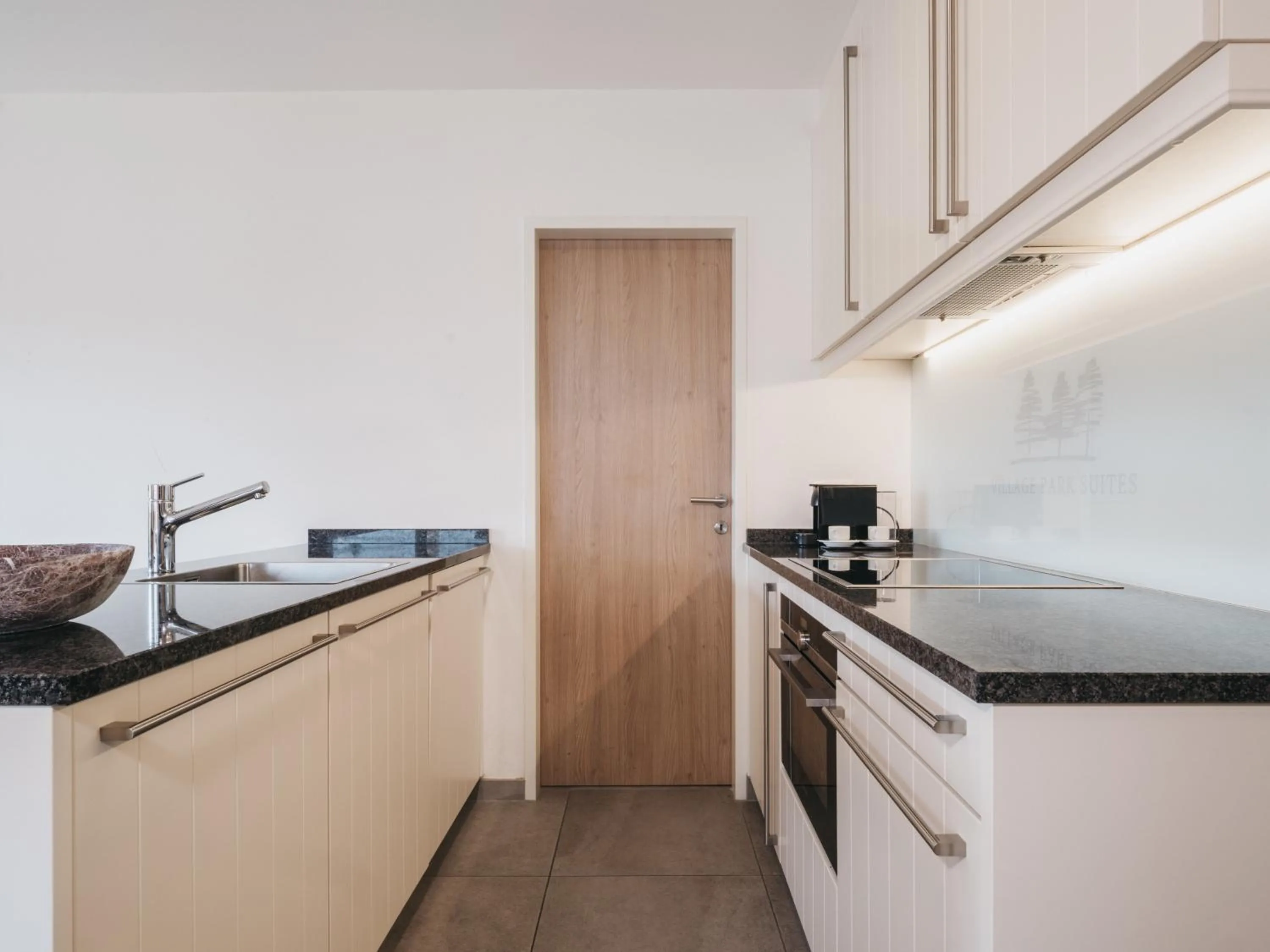 kitchen in Village Park Suites