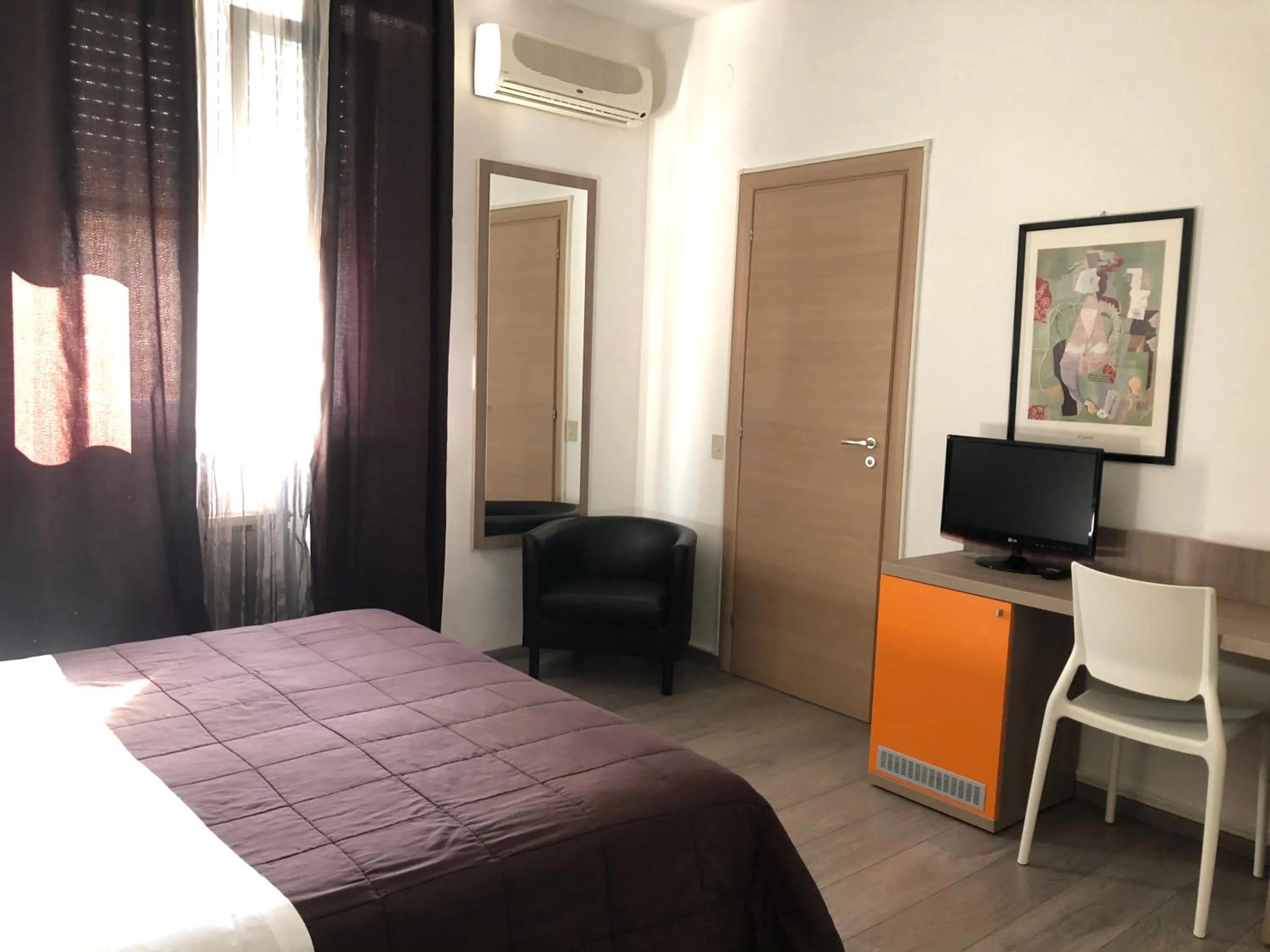 Bed in Hotel Capitol