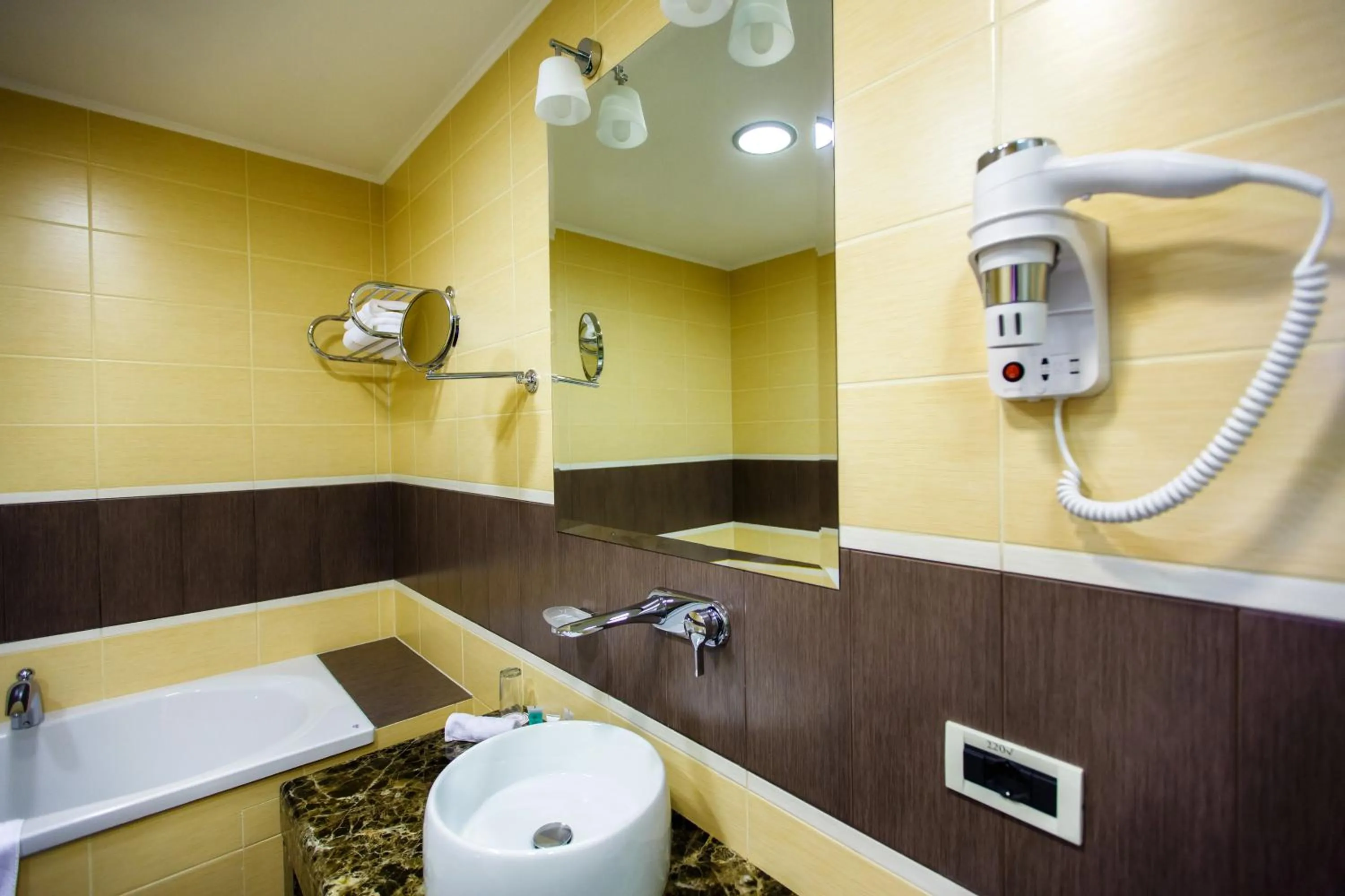 Bathroom in Menorah Hotel