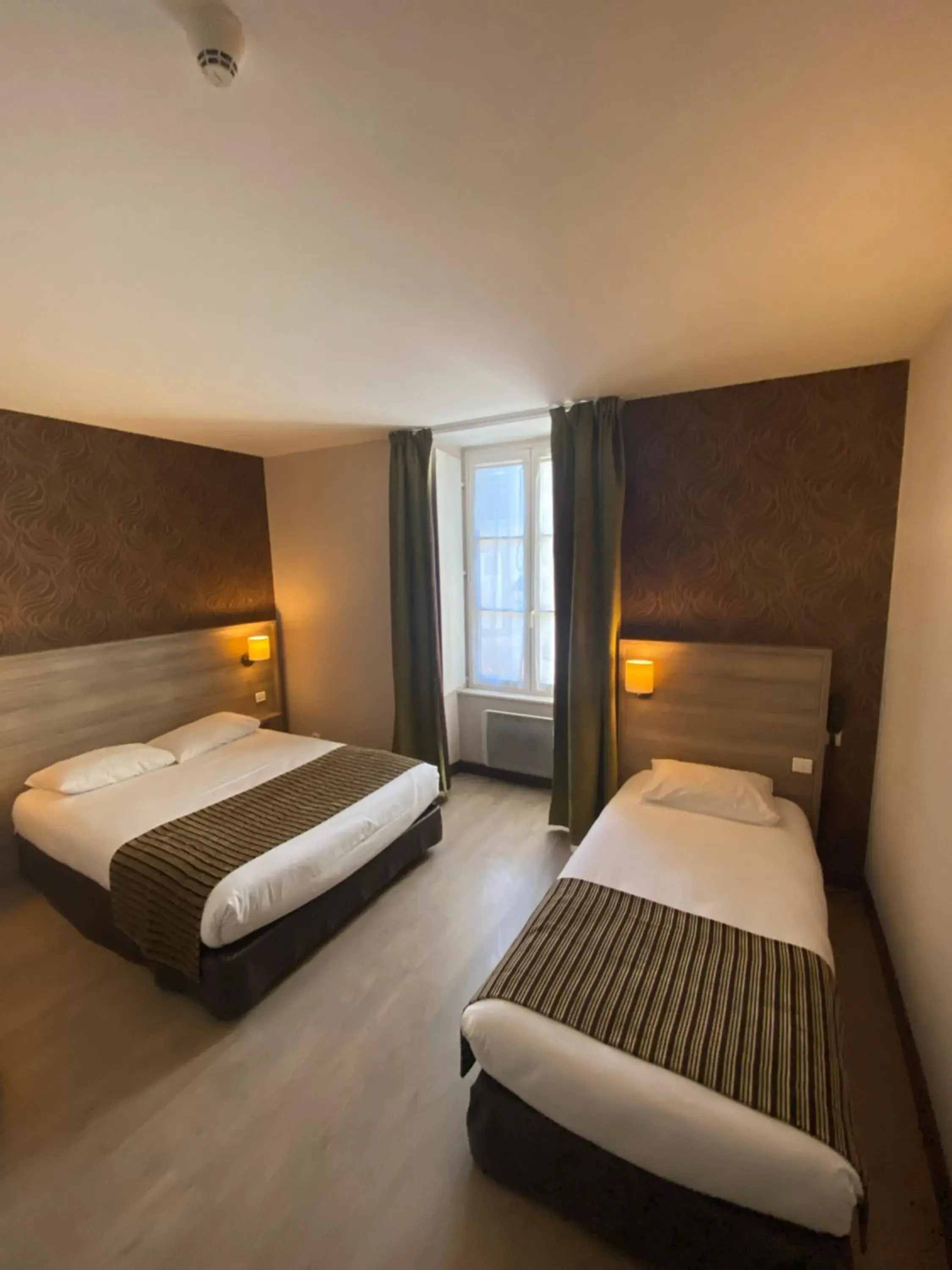 Photo of the whole room, Bed in Logis Hôtel Le Saint Georges Photo of the whole room, Bed in Logis Hôtel Le Saint Georges