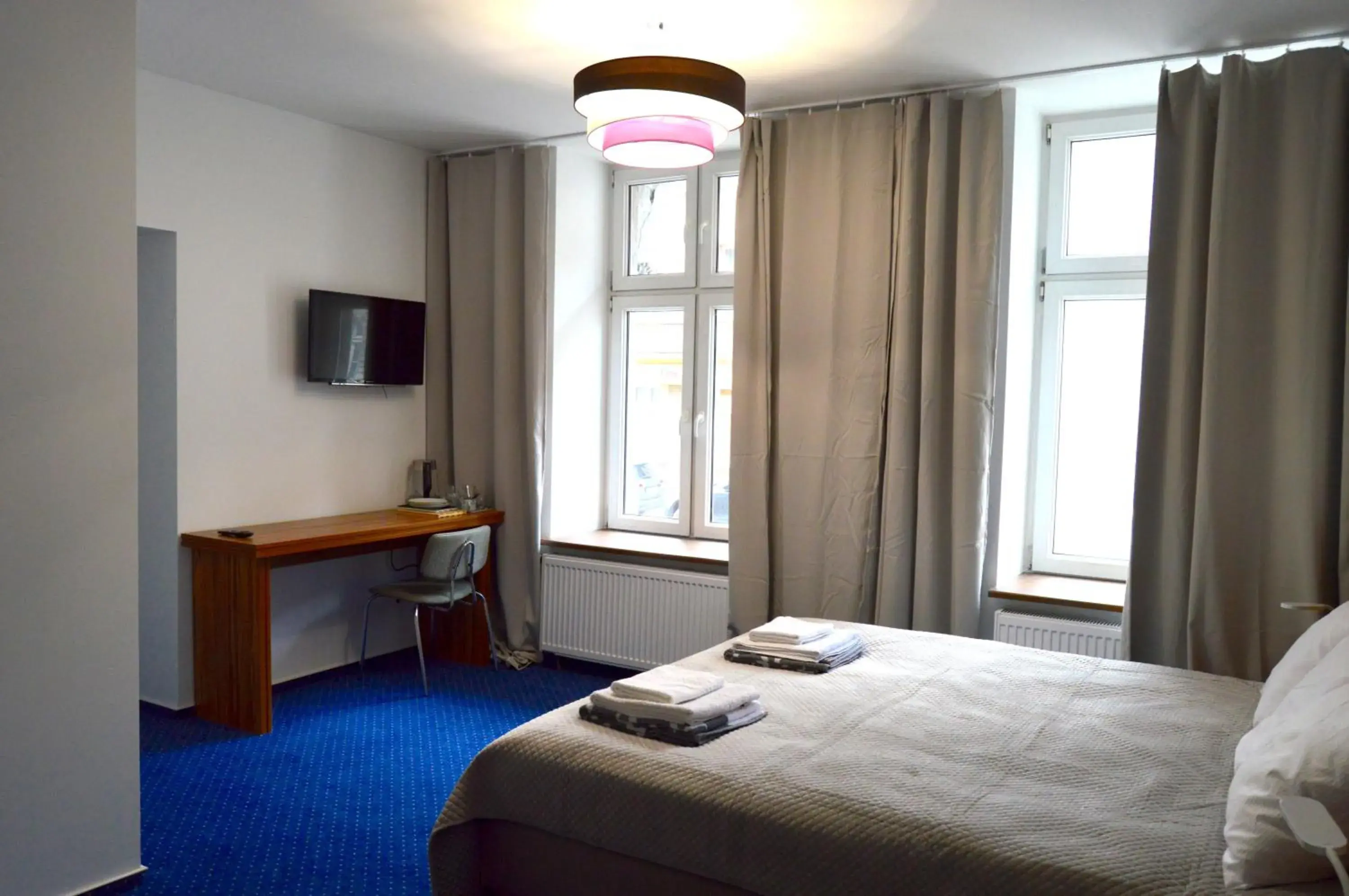 Quadruple Room with Bathroom - single occupancy in Apartamenty Next to Galeria Katowice Quadruple Room with Bathroom - single occupancy in Apartamenty Next to Galeria Katowice