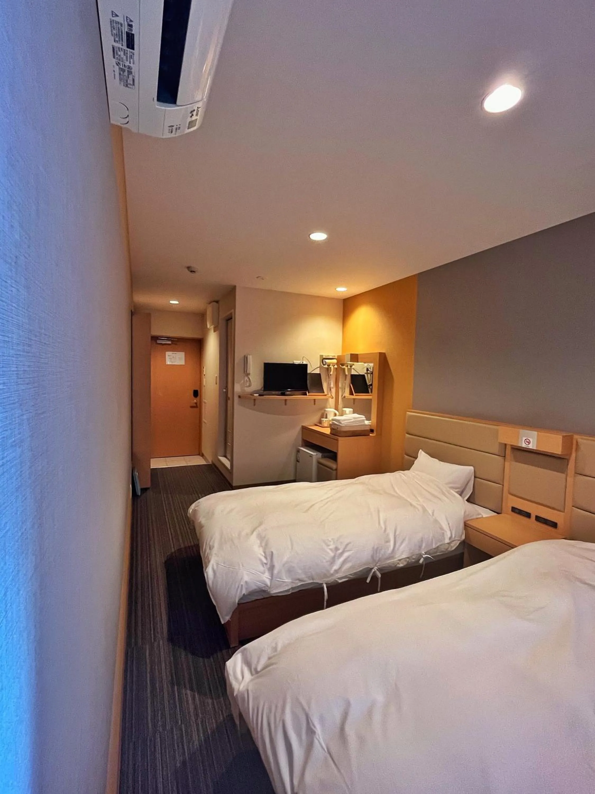 Bed in Kansai Seaside Hotel