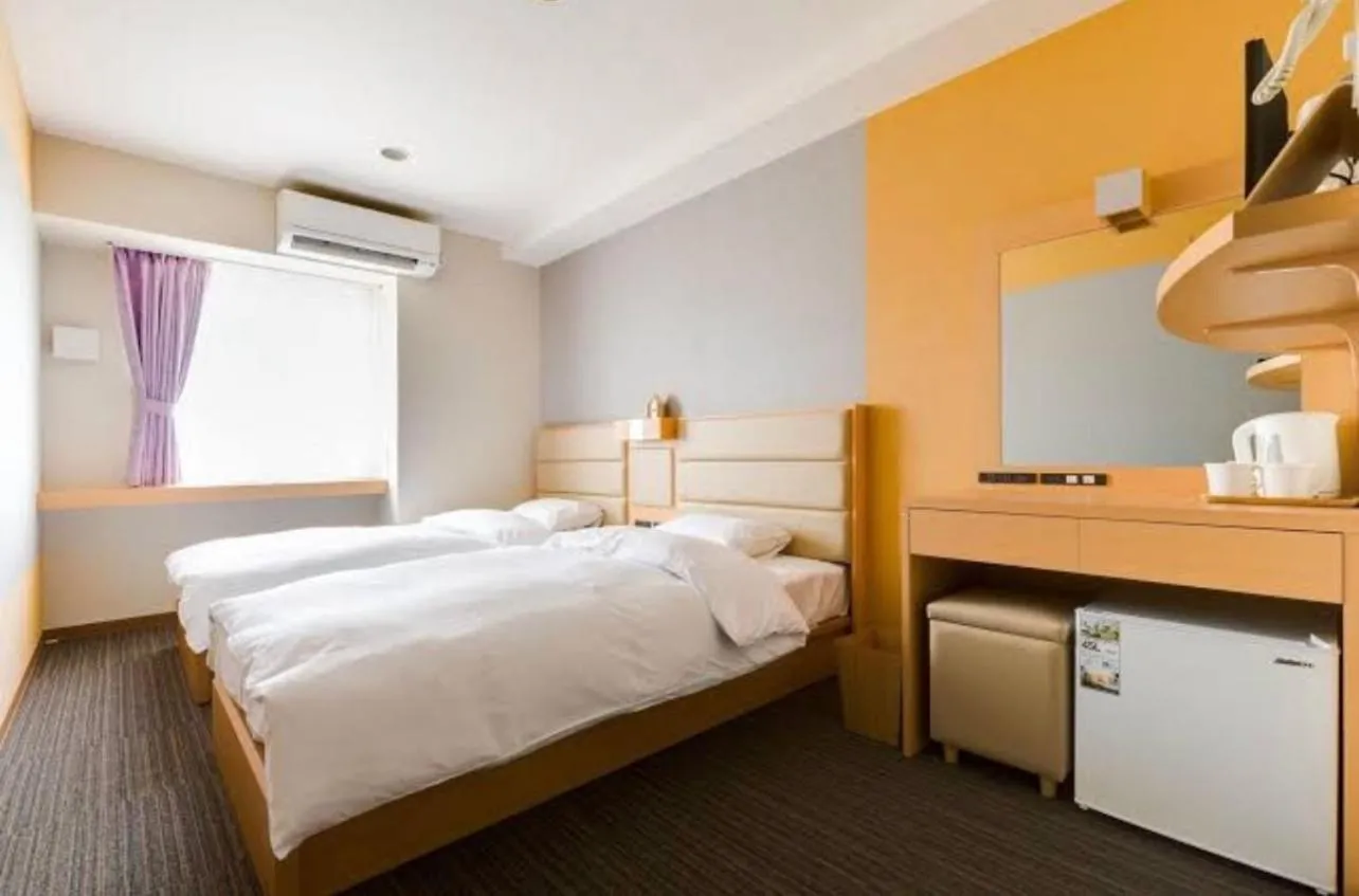 Bed in Kansai Seaside Hotel