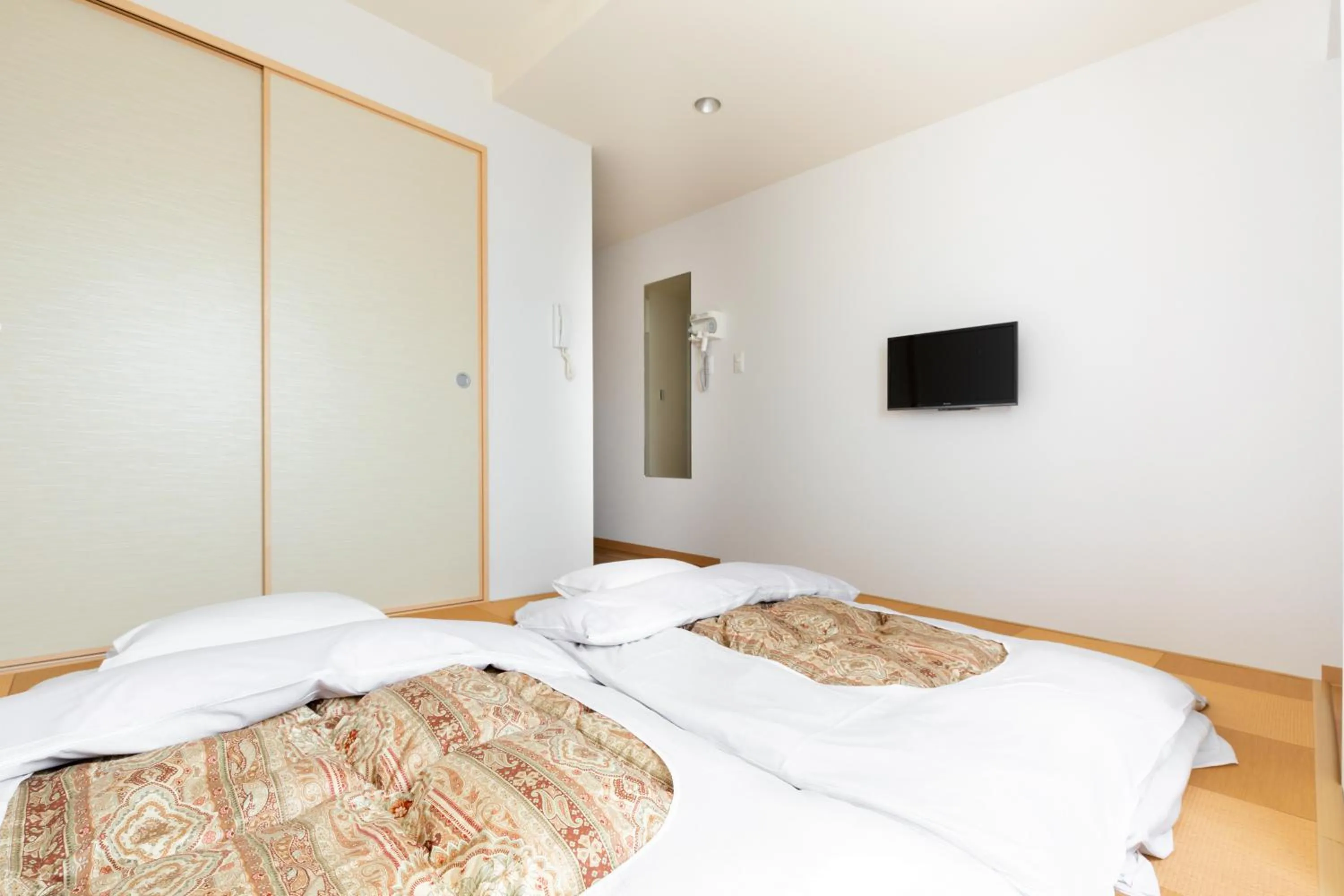 Bed in Kansai Seaside Hotel