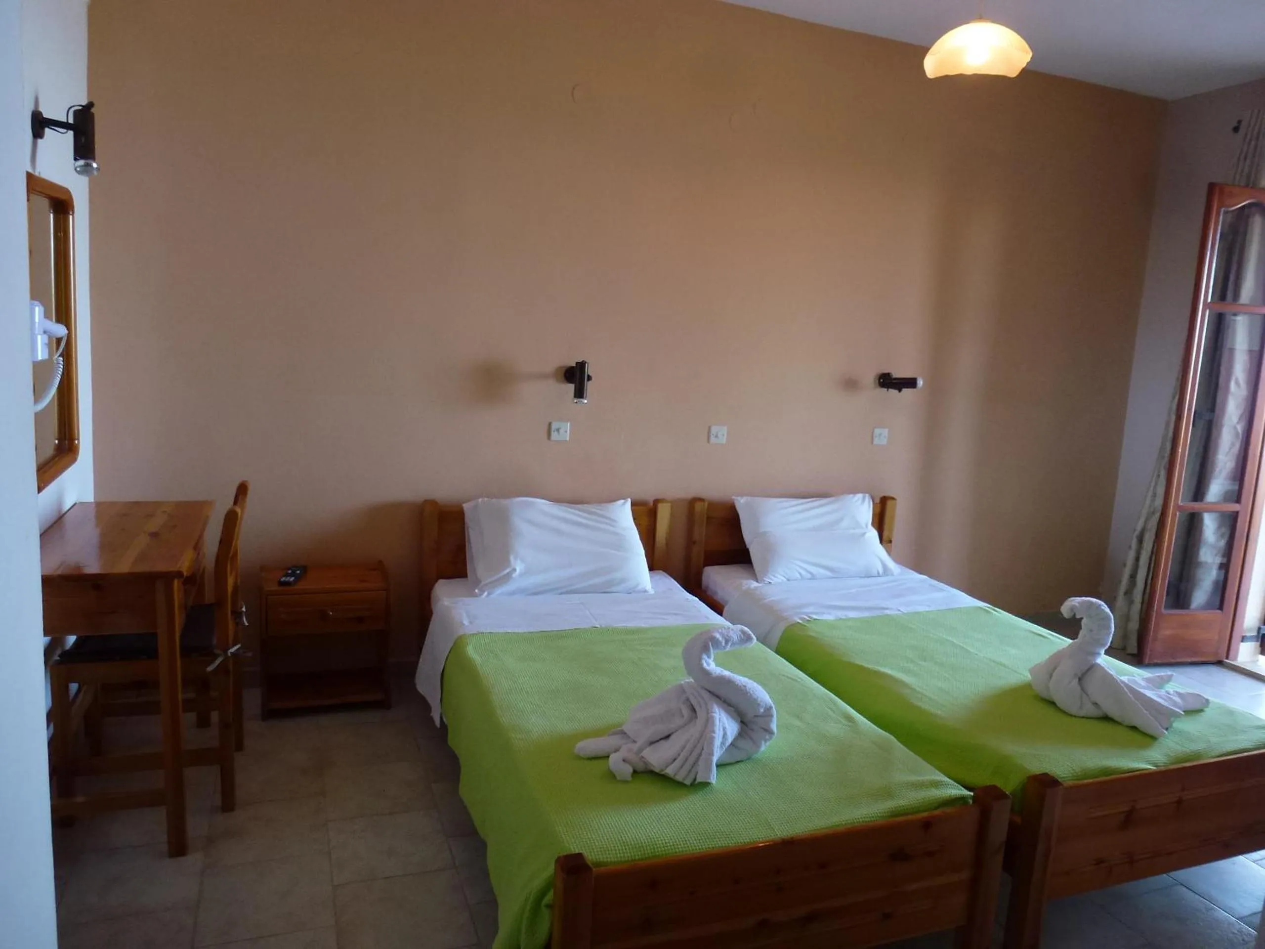 Bed in Marinos Studios at Lourdata village