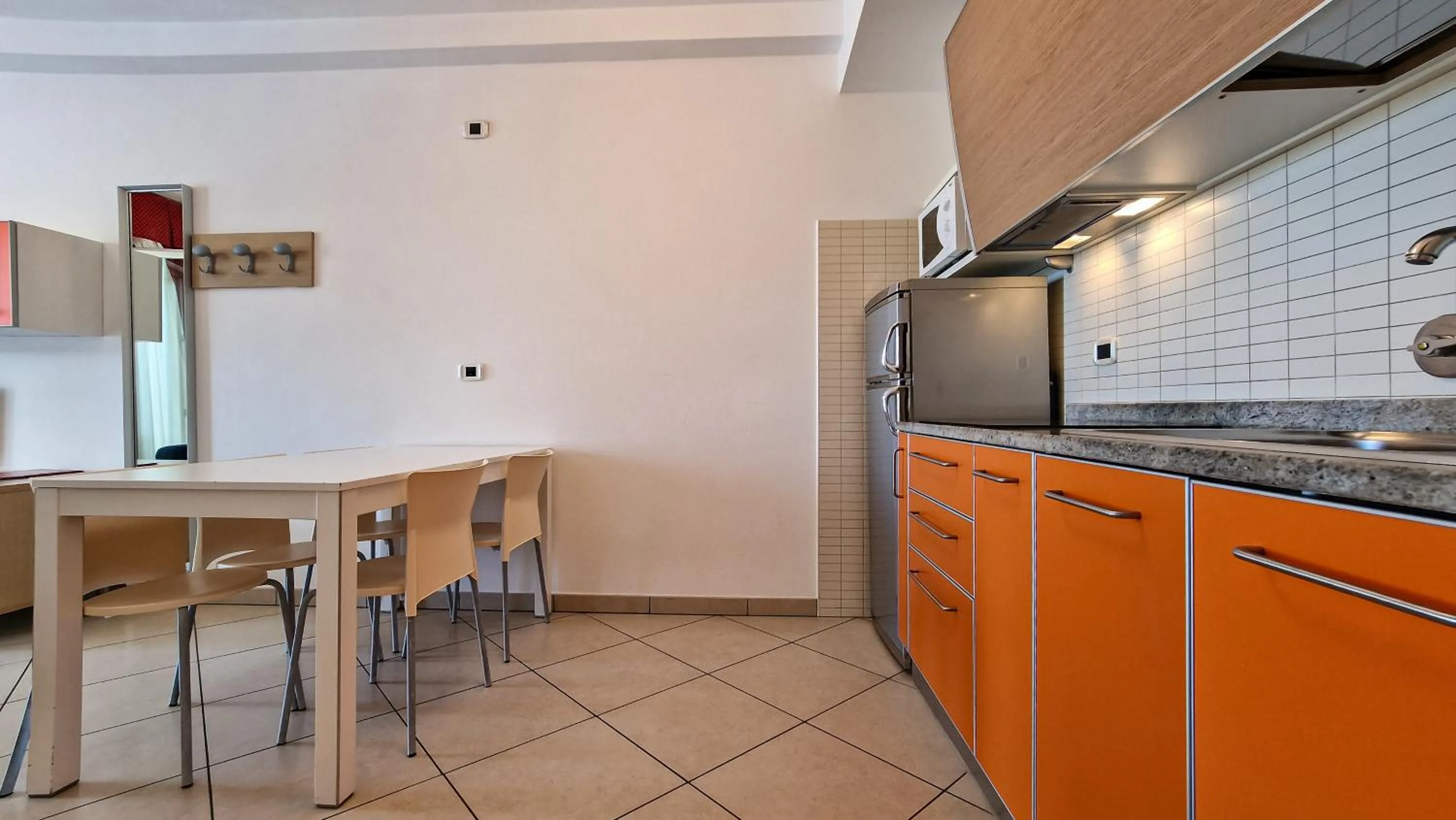 Kitchen or kitchenette in Ashanti Aparthotel Wellness&Spa