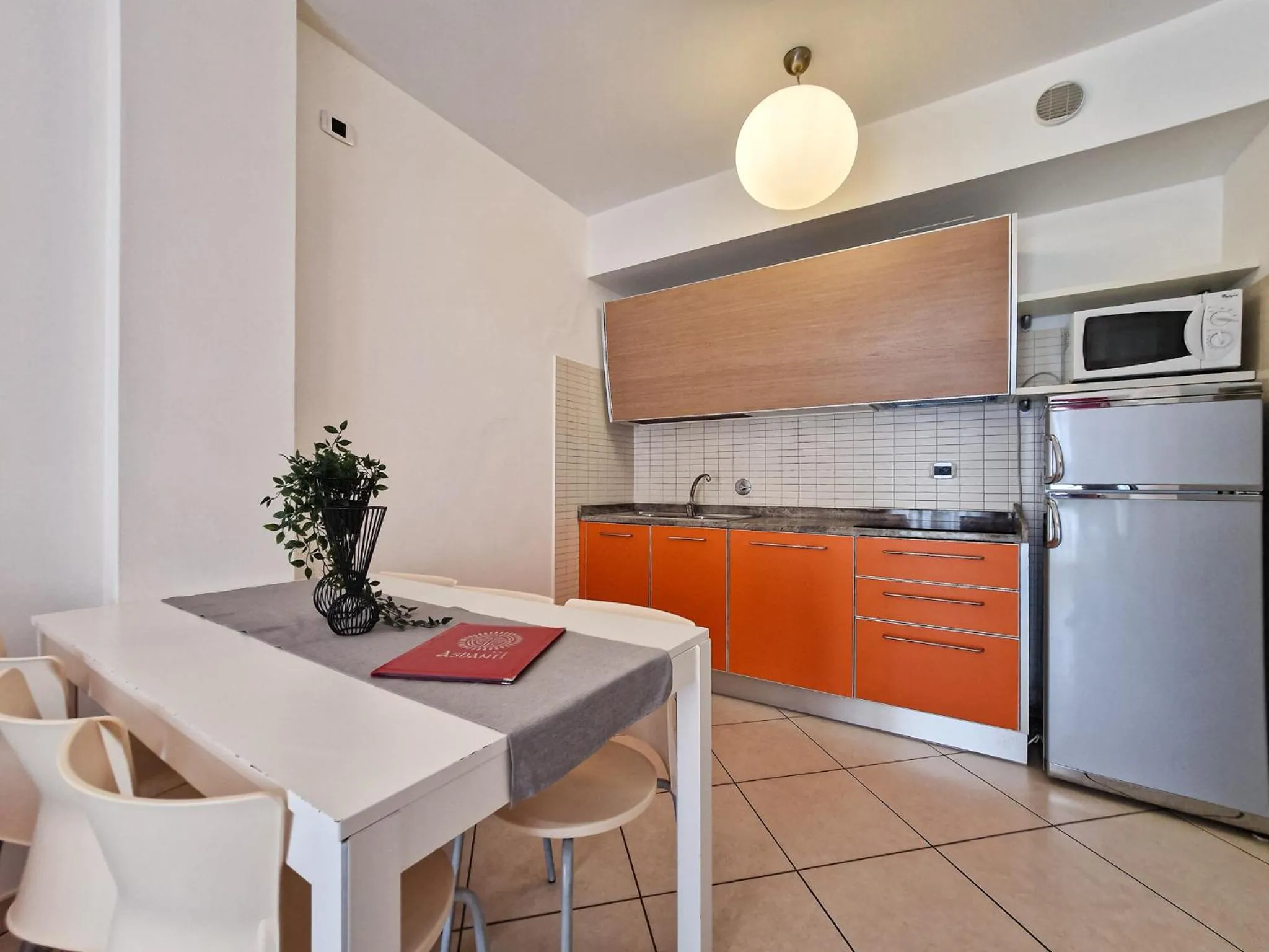 Kitchen or kitchenette in Ashanti Aparthotel Wellness&Spa