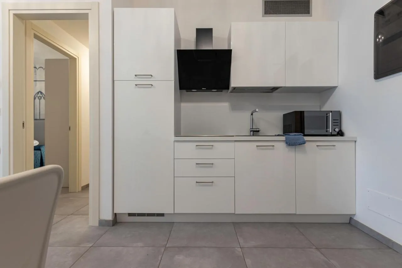 Kitchen or kitchenette in Ashanti Aparthotel Wellness&Spa
