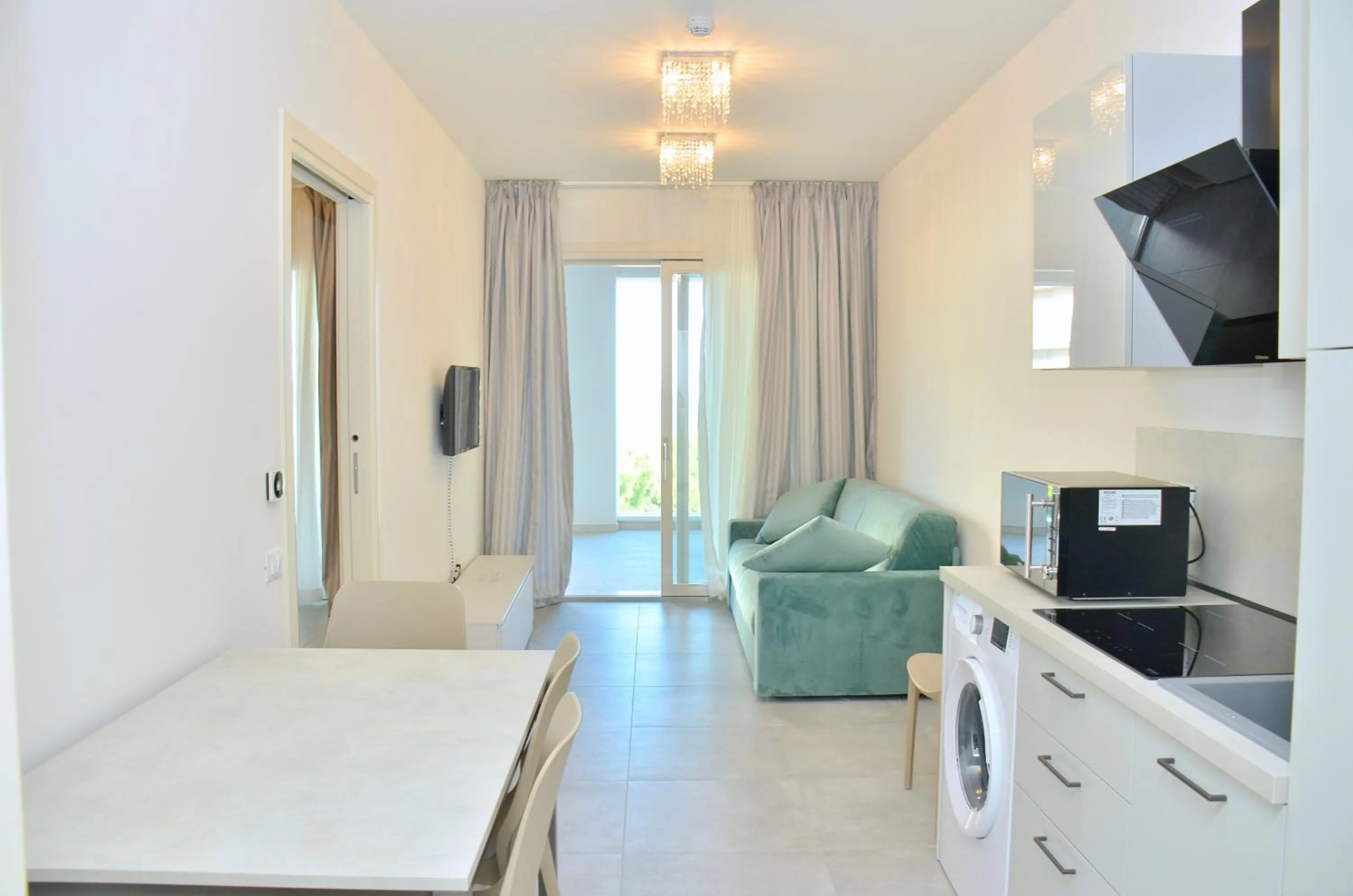 Kitchen or kitchenette in Ashanti Aparthotel Wellness&Spa