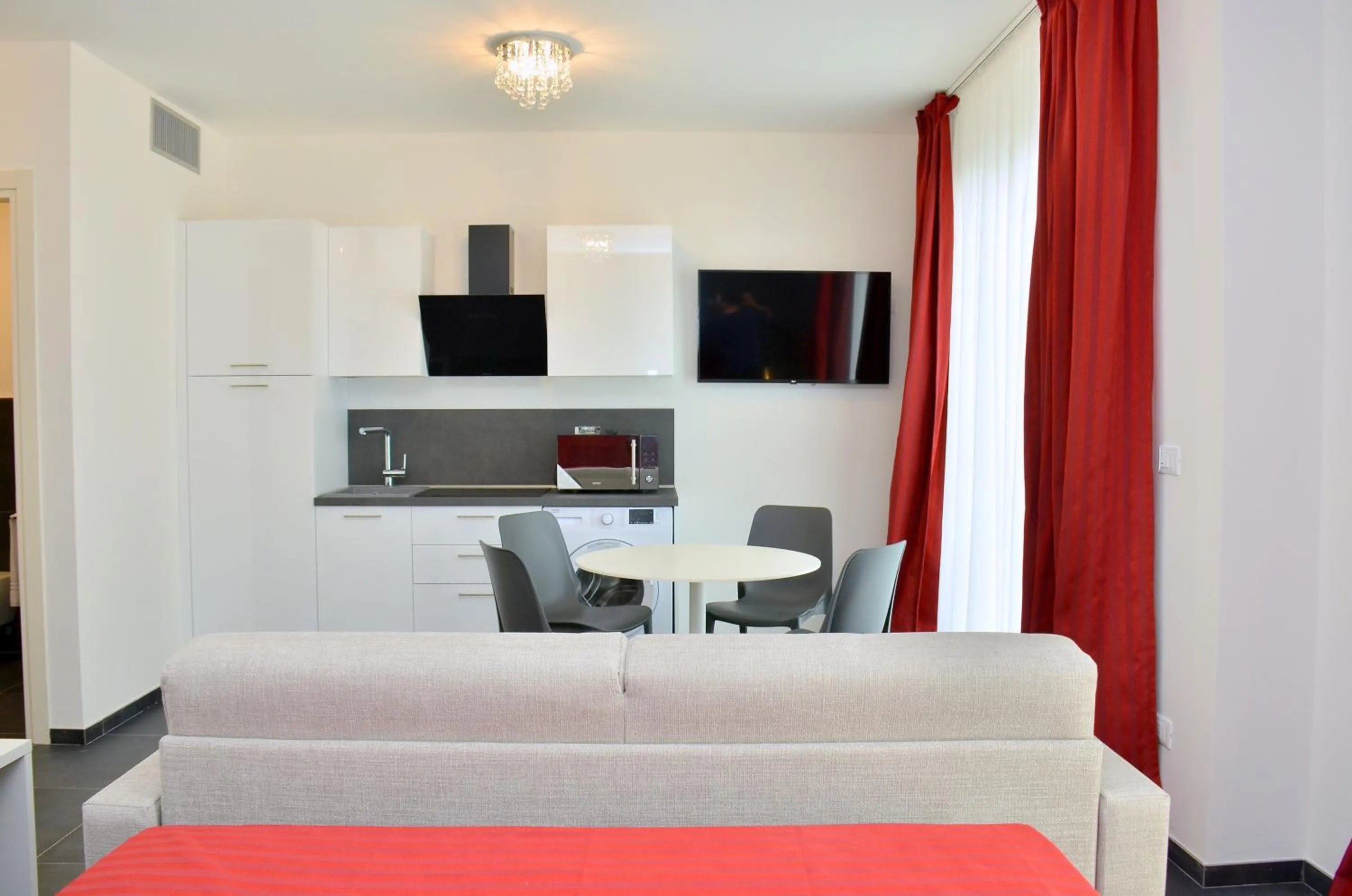 Kitchen or kitchenette in Ashanti Aparthotel Wellness&Spa