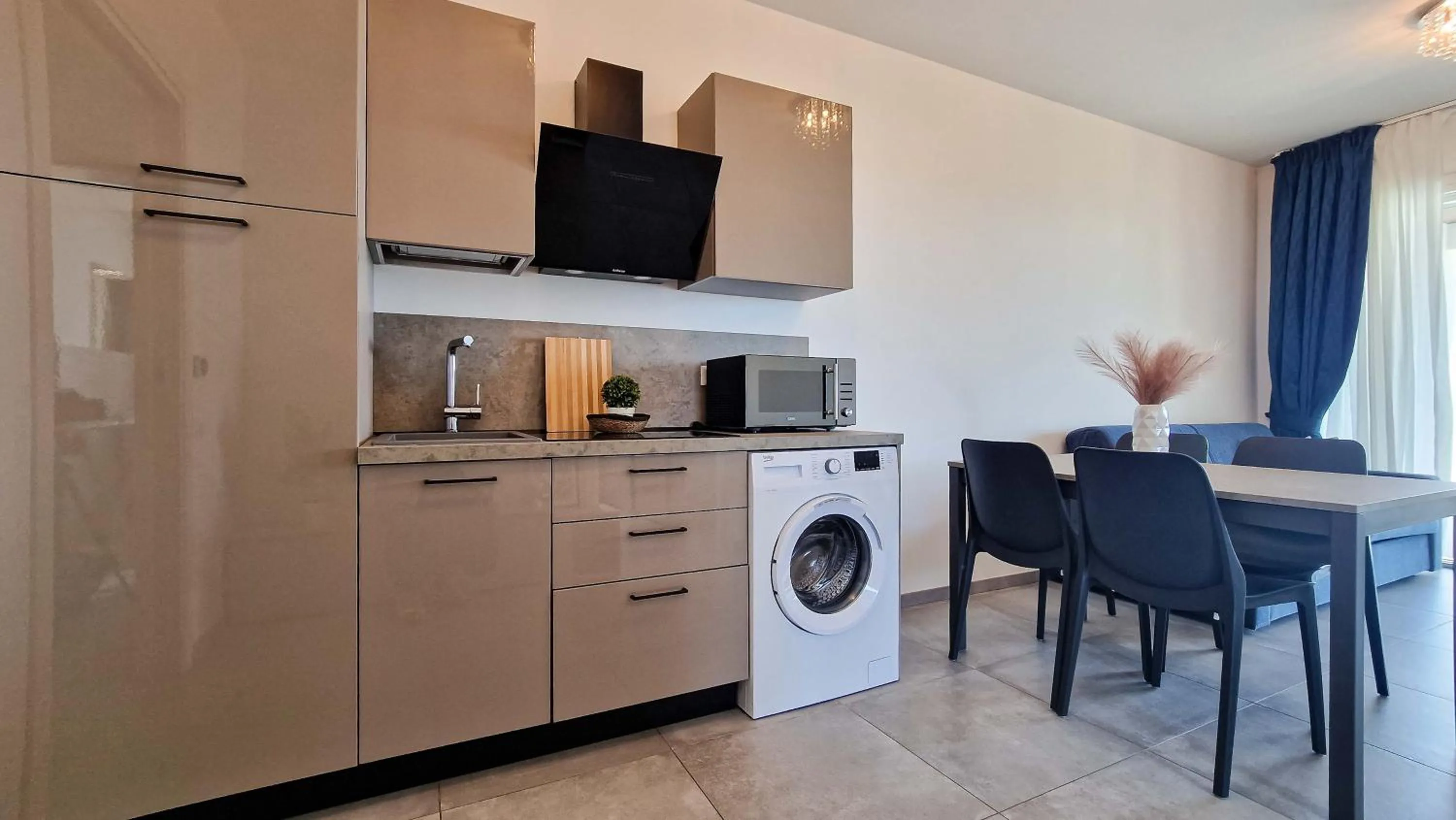 Kitchen or kitchenette in Ashanti Aparthotel Wellness&Spa