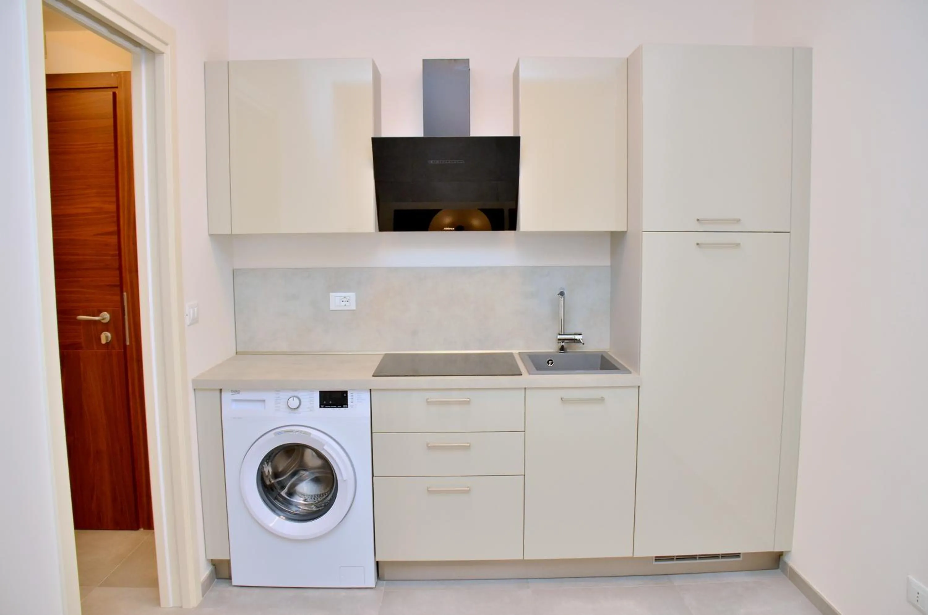 Kitchen or kitchenette in Ashanti Aparthotel Wellness&Spa