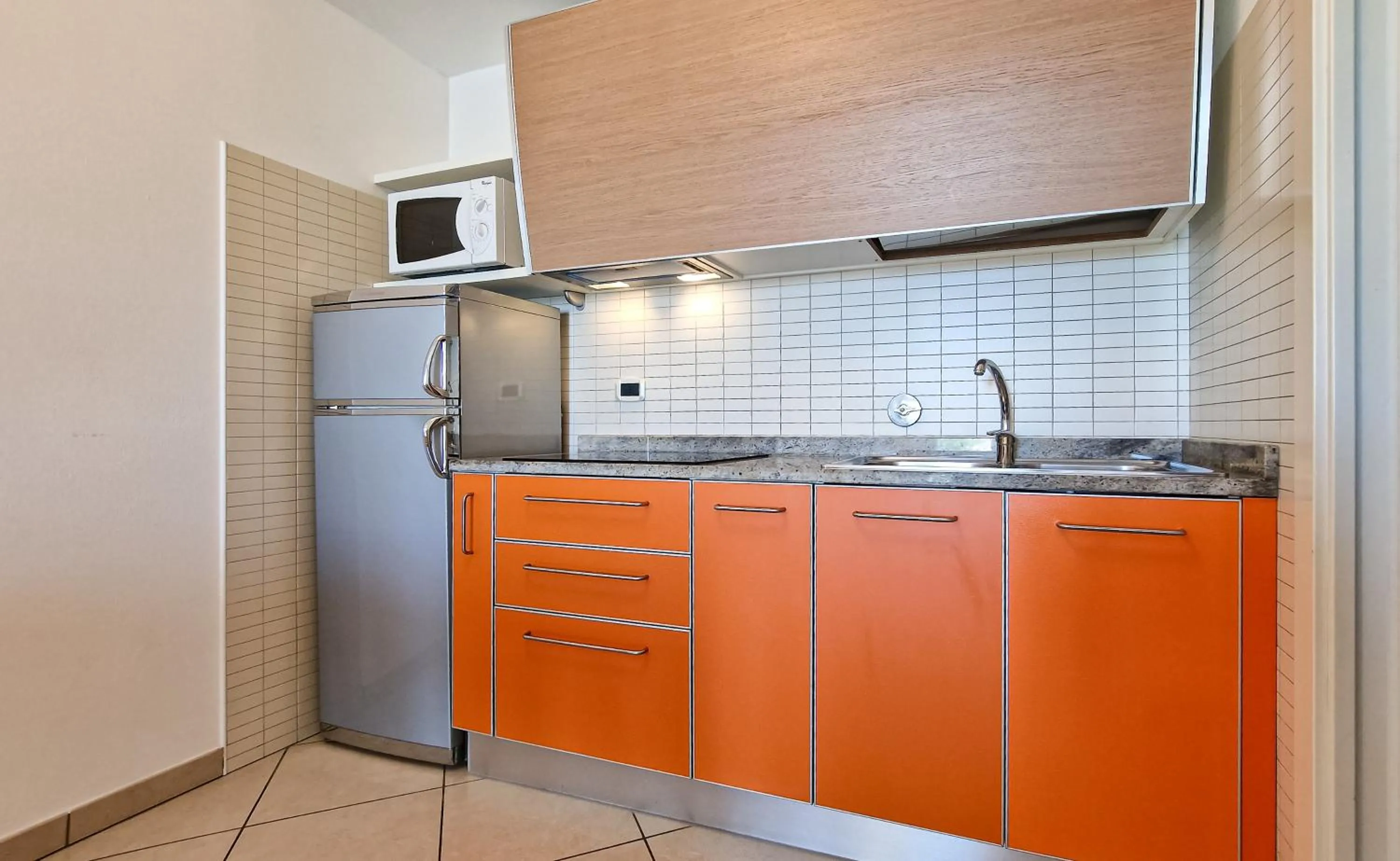 Kitchen or kitchenette in Ashanti Aparthotel Wellness&Spa