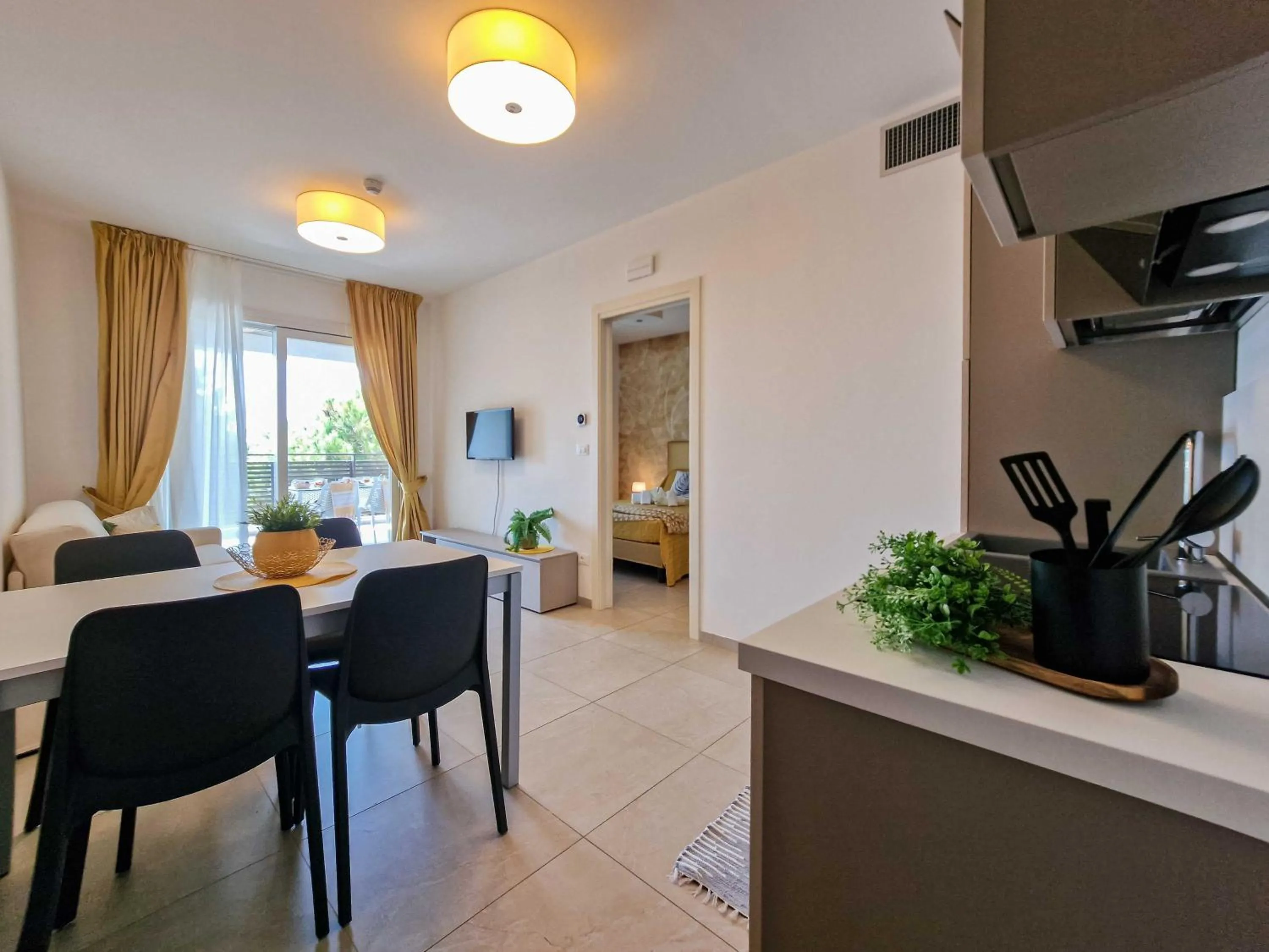 Kitchen or kitchenette in Ashanti Aparthotel Wellness&Spa