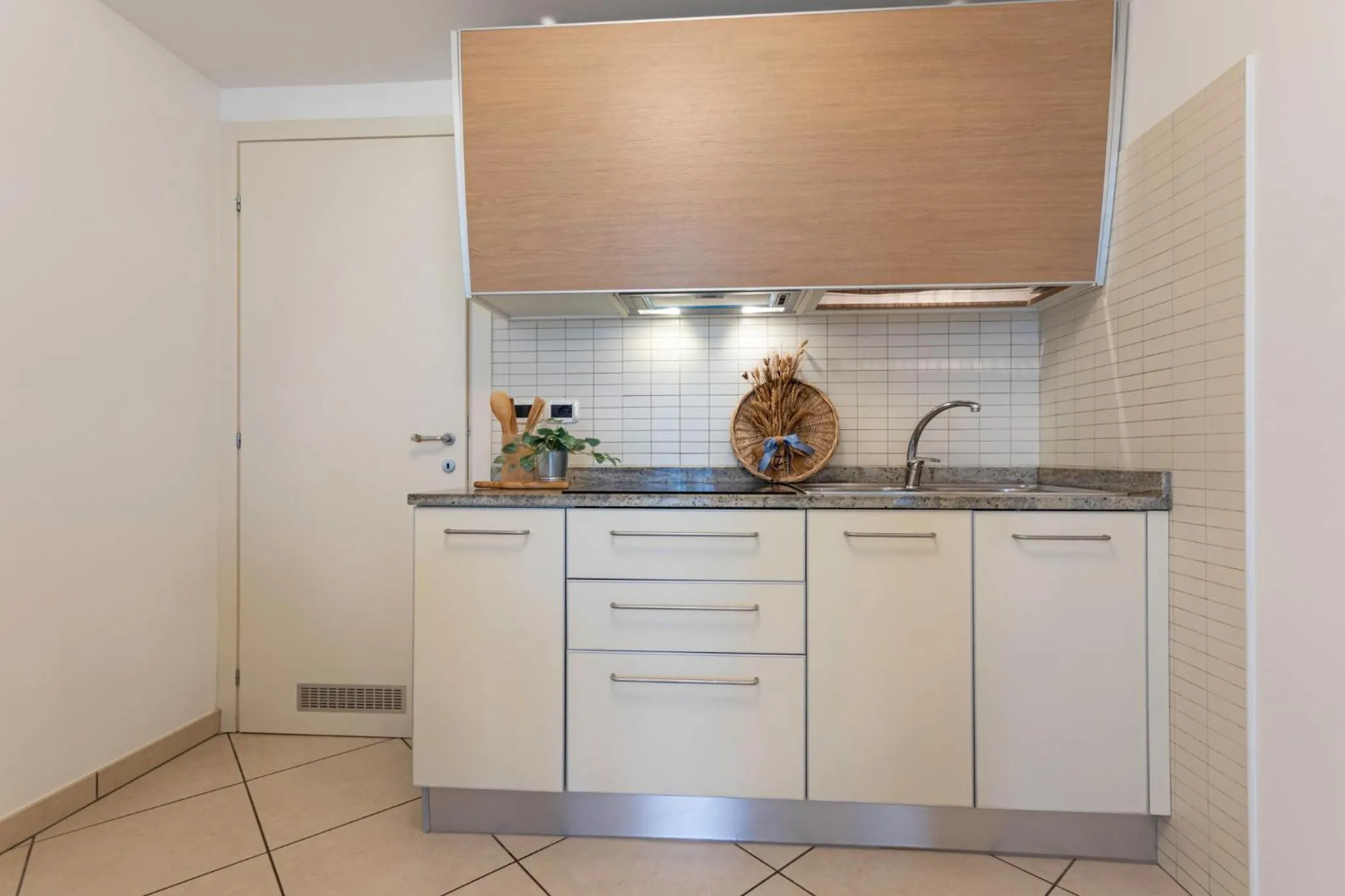 Kitchen or kitchenette in Ashanti Aparthotel Wellness&Spa