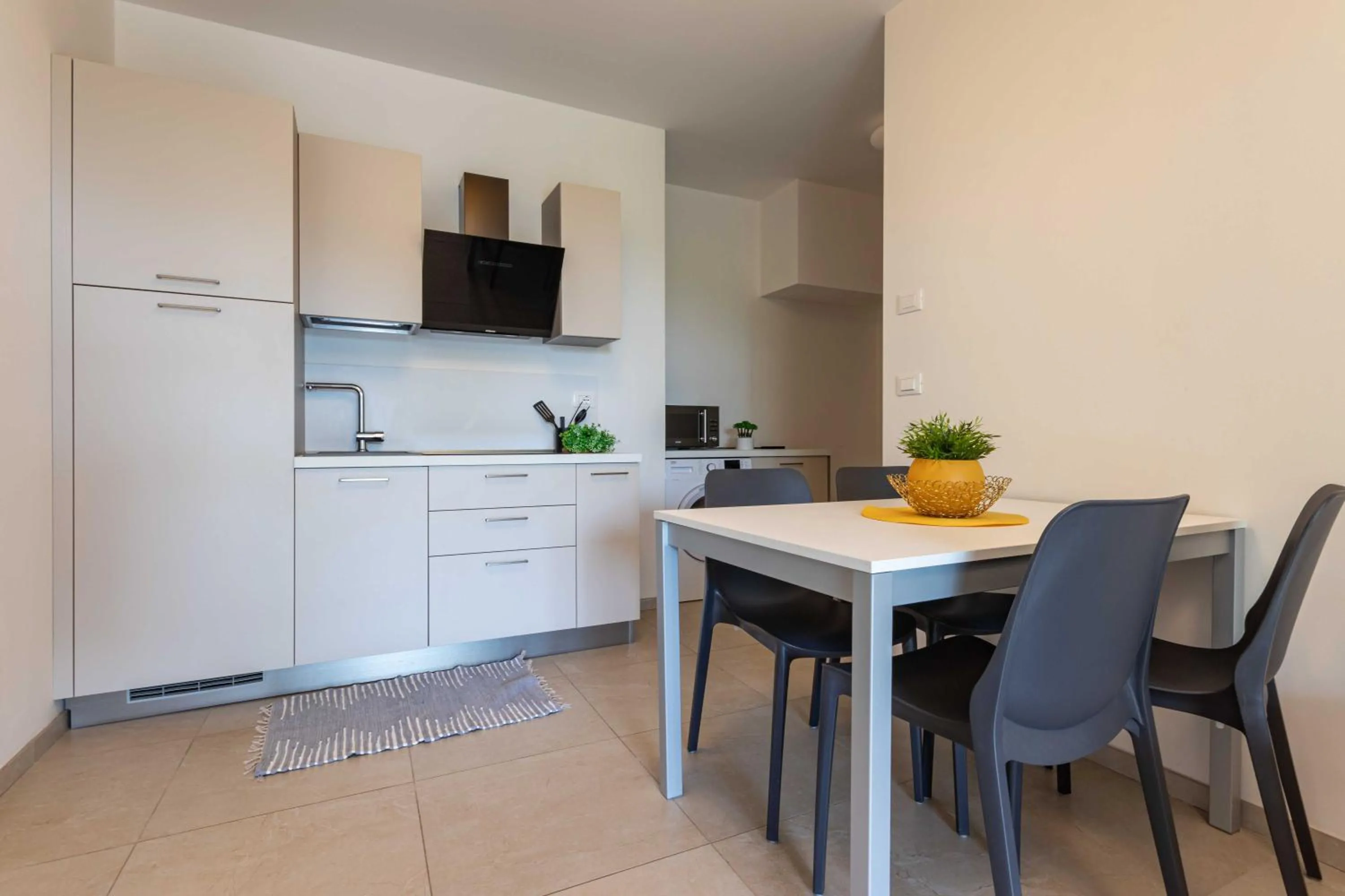 Kitchen or kitchenette in Ashanti Aparthotel Wellness&Spa