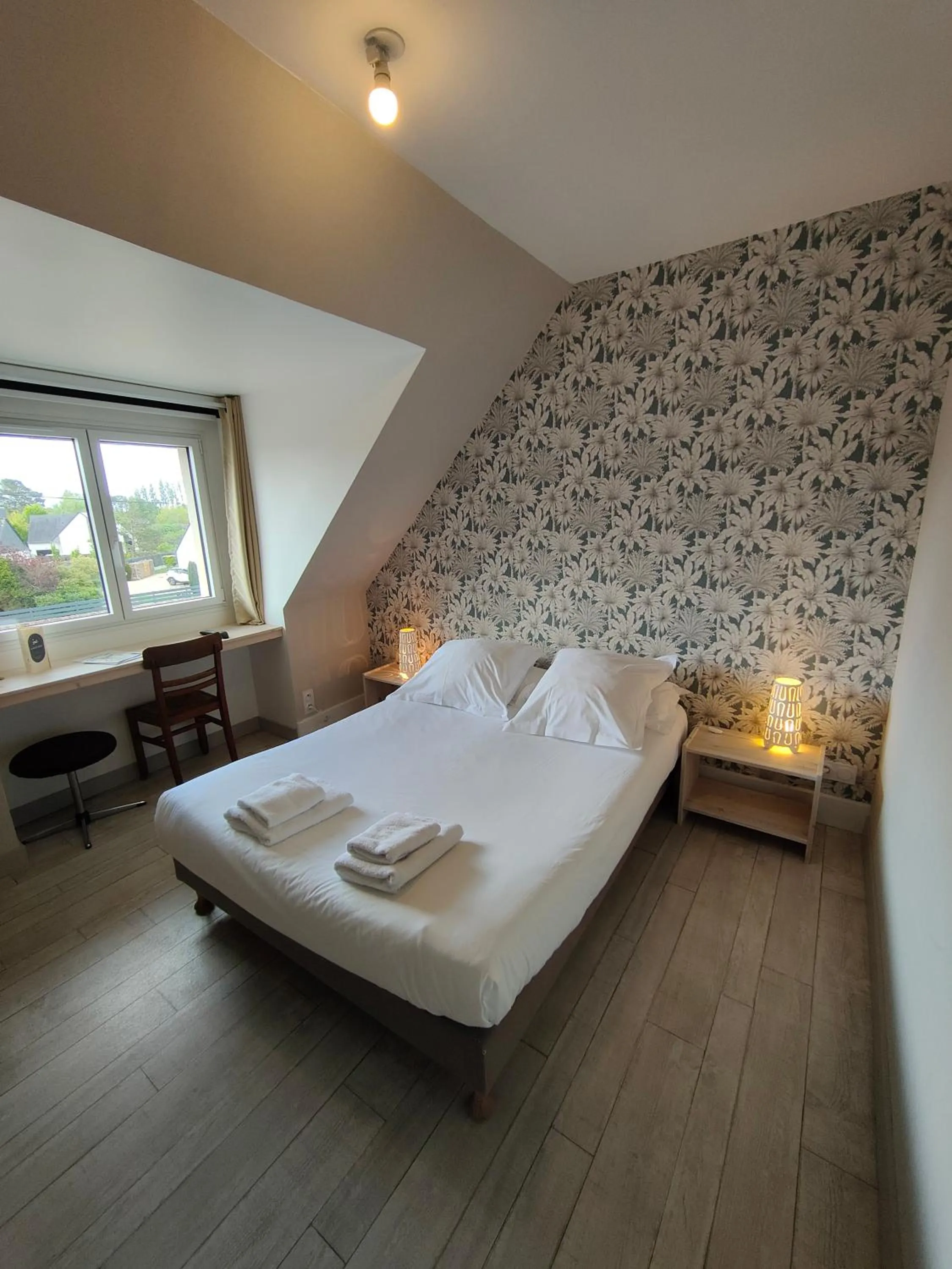 Photo of the whole room, Bed in Hôtel Restaurant La Voile Bleue