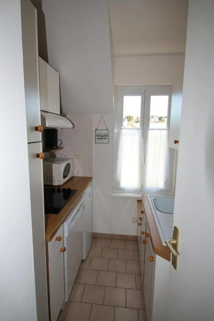 Kitchen or kitchenette in Hôtel Au Clos Paillé La Roche Posay