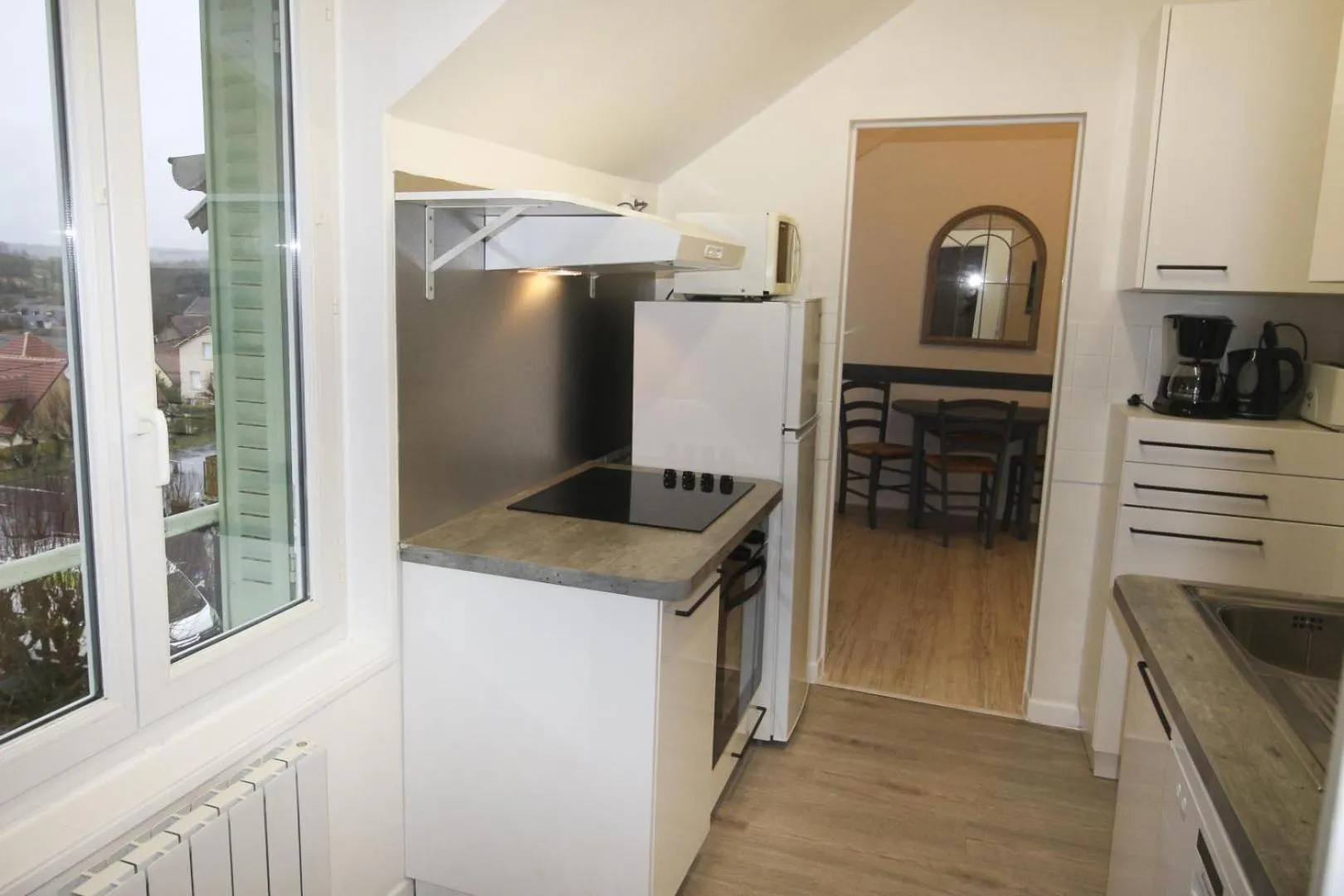 Kitchen or kitchenette in Hôtel Au Clos Paillé La Roche Posay