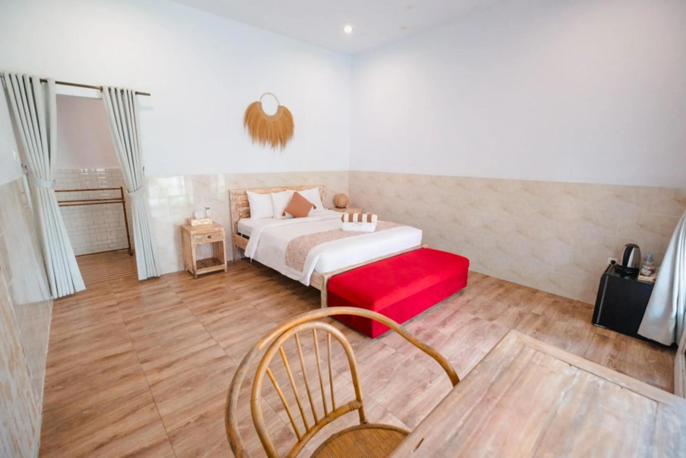 Photo of the whole room, Bed in Agung Wiwin Homestay & Restaurant