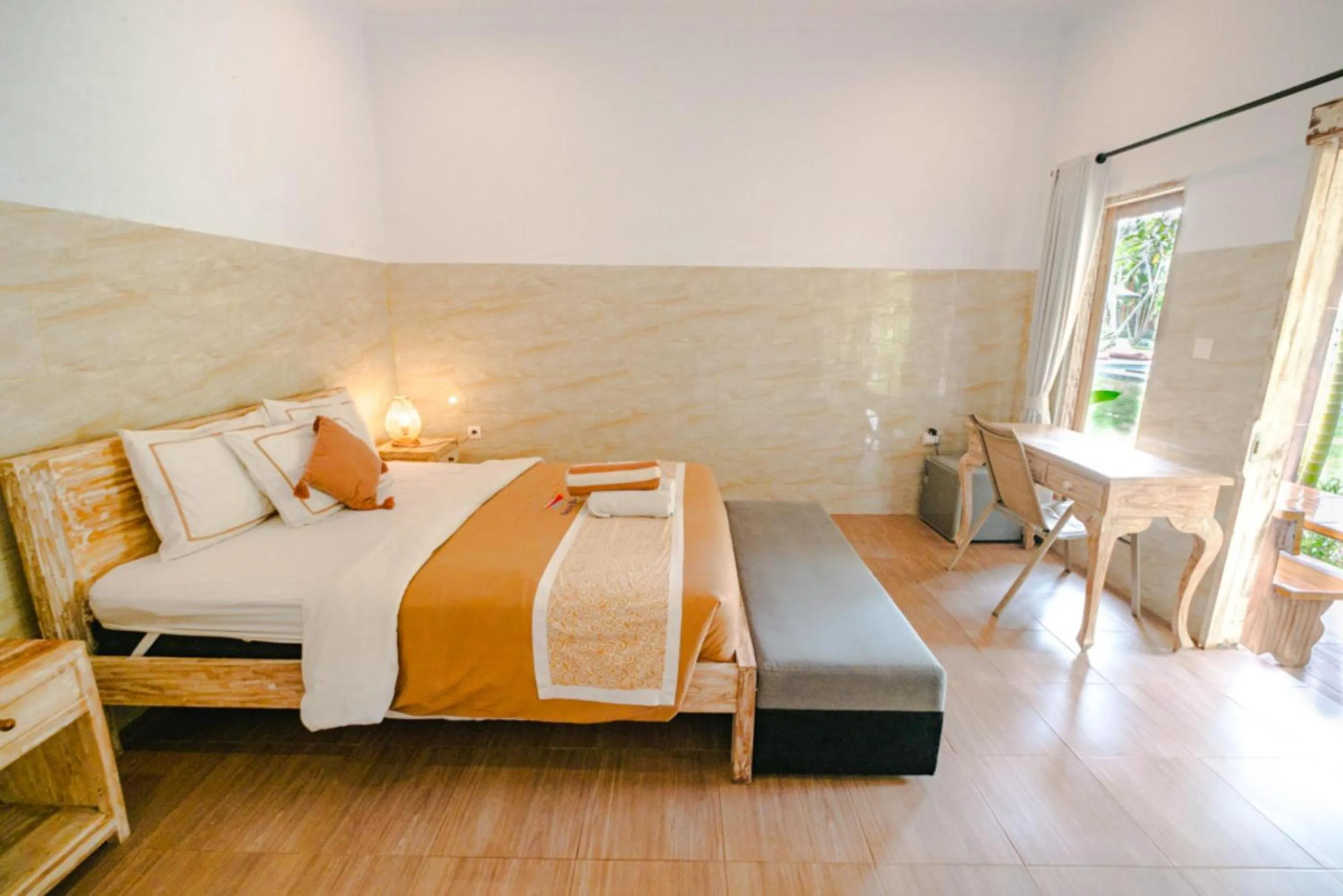 Bed in Agung Wiwin Homestay & Restaurant