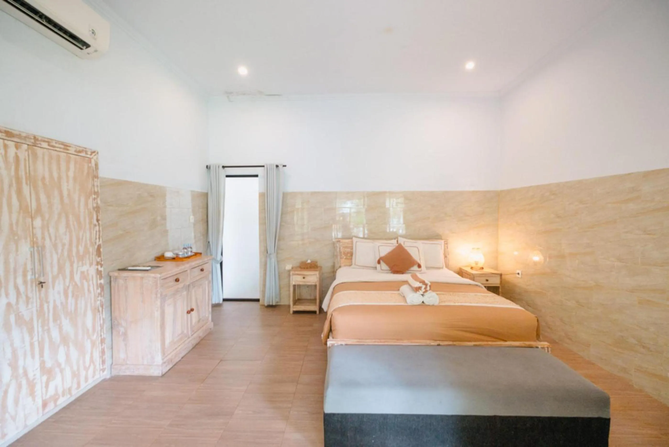 Bed in Agung Wiwin Homestay & Restaurant