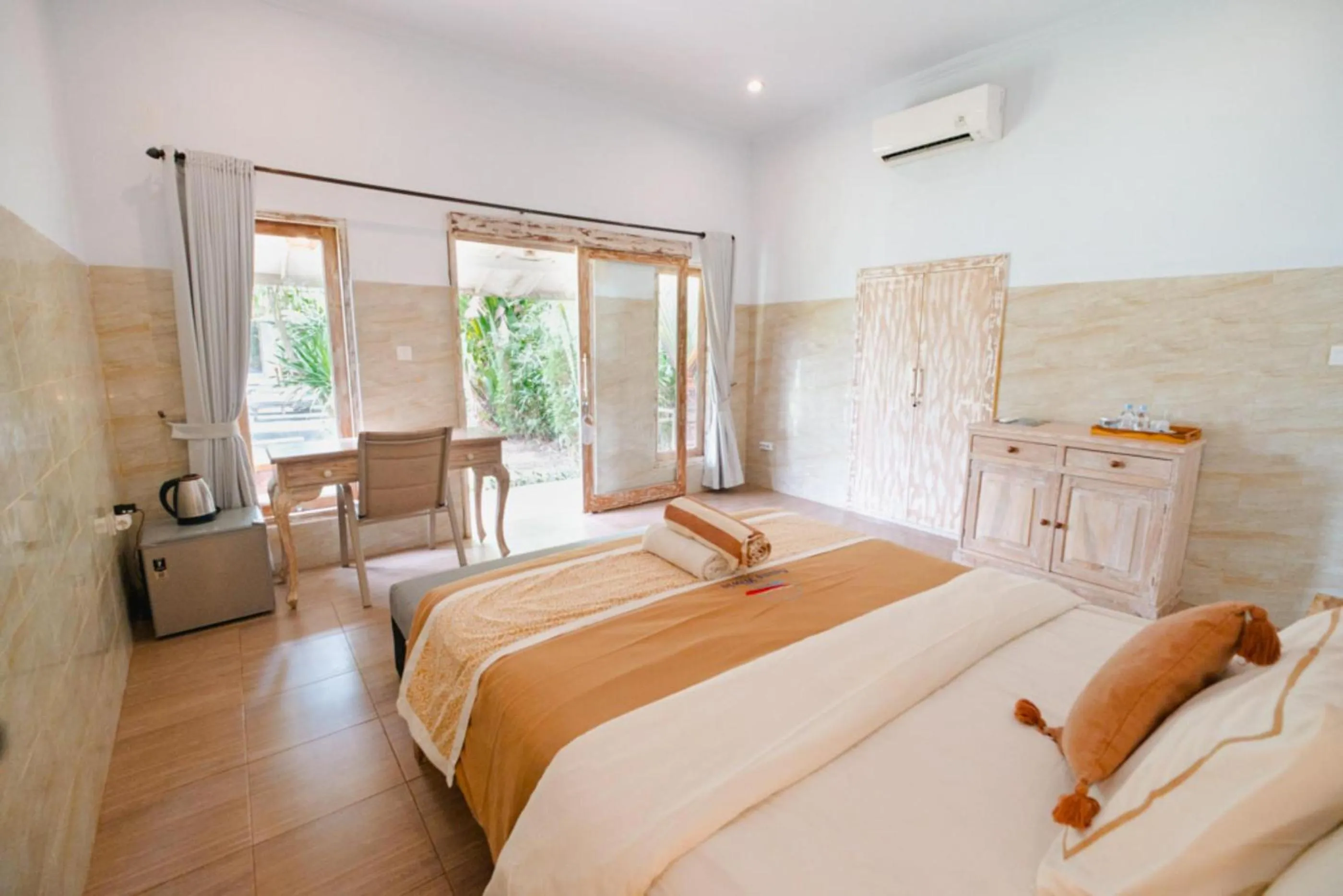 Bed in Agung Wiwin Homestay & Restaurant