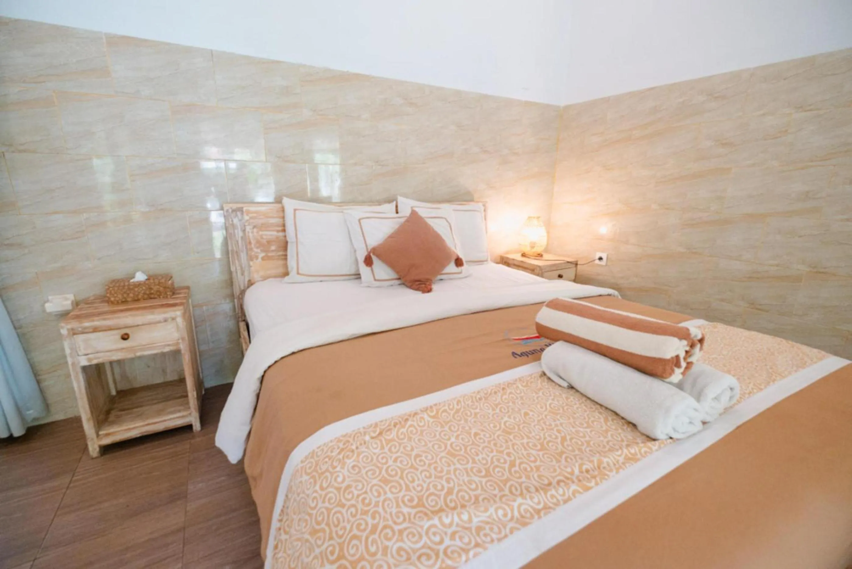 Bed in Agung Wiwin Homestay & Restaurant