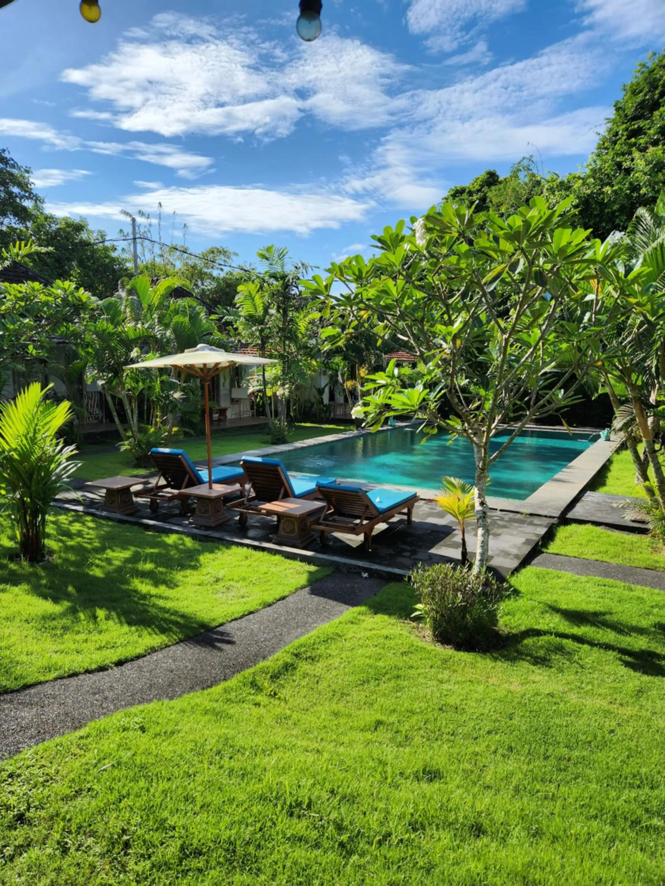 Swimming pool in Agung Wiwin Homestay & Restaurant