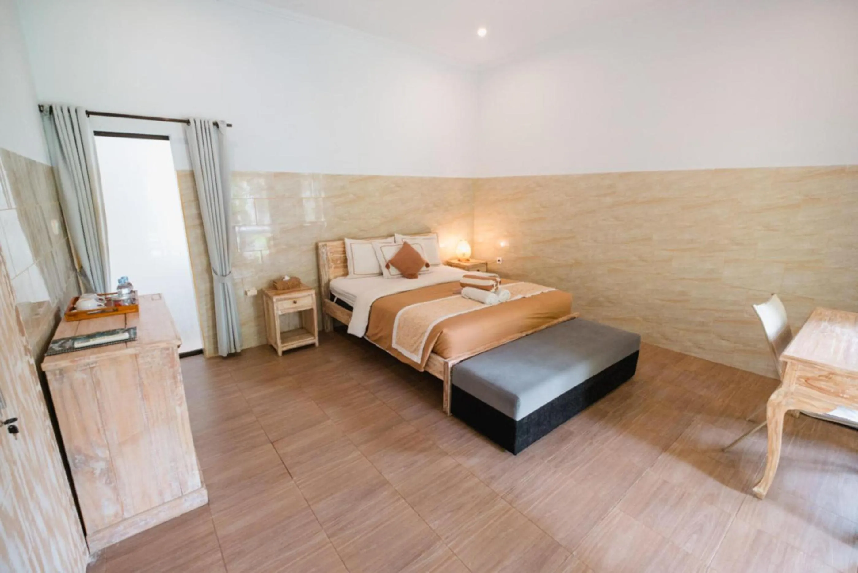 Bed in Agung Wiwin Homestay & Restaurant