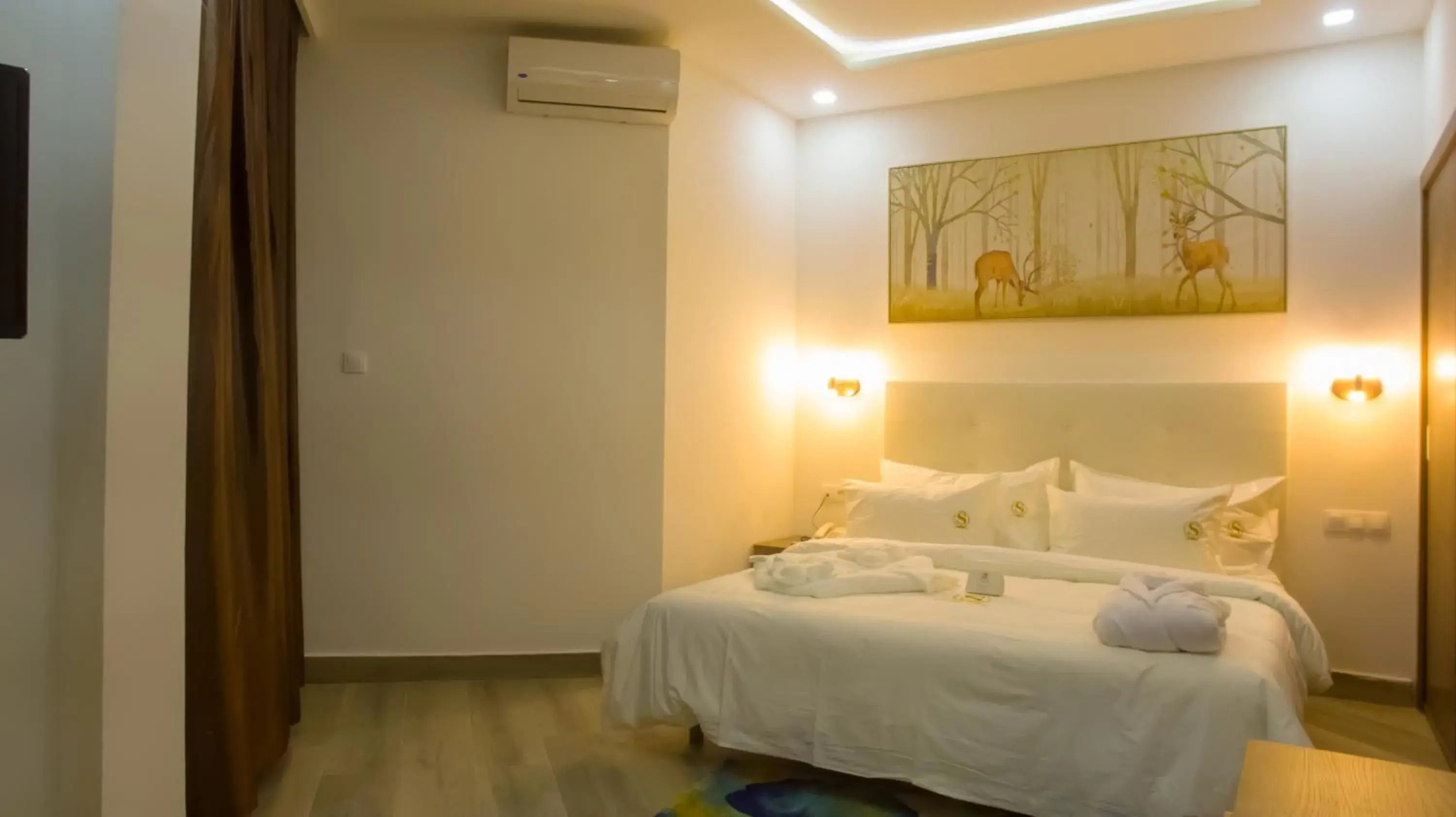 Bed in SUNSET HOTEL Bed in SUNSET HOTEL