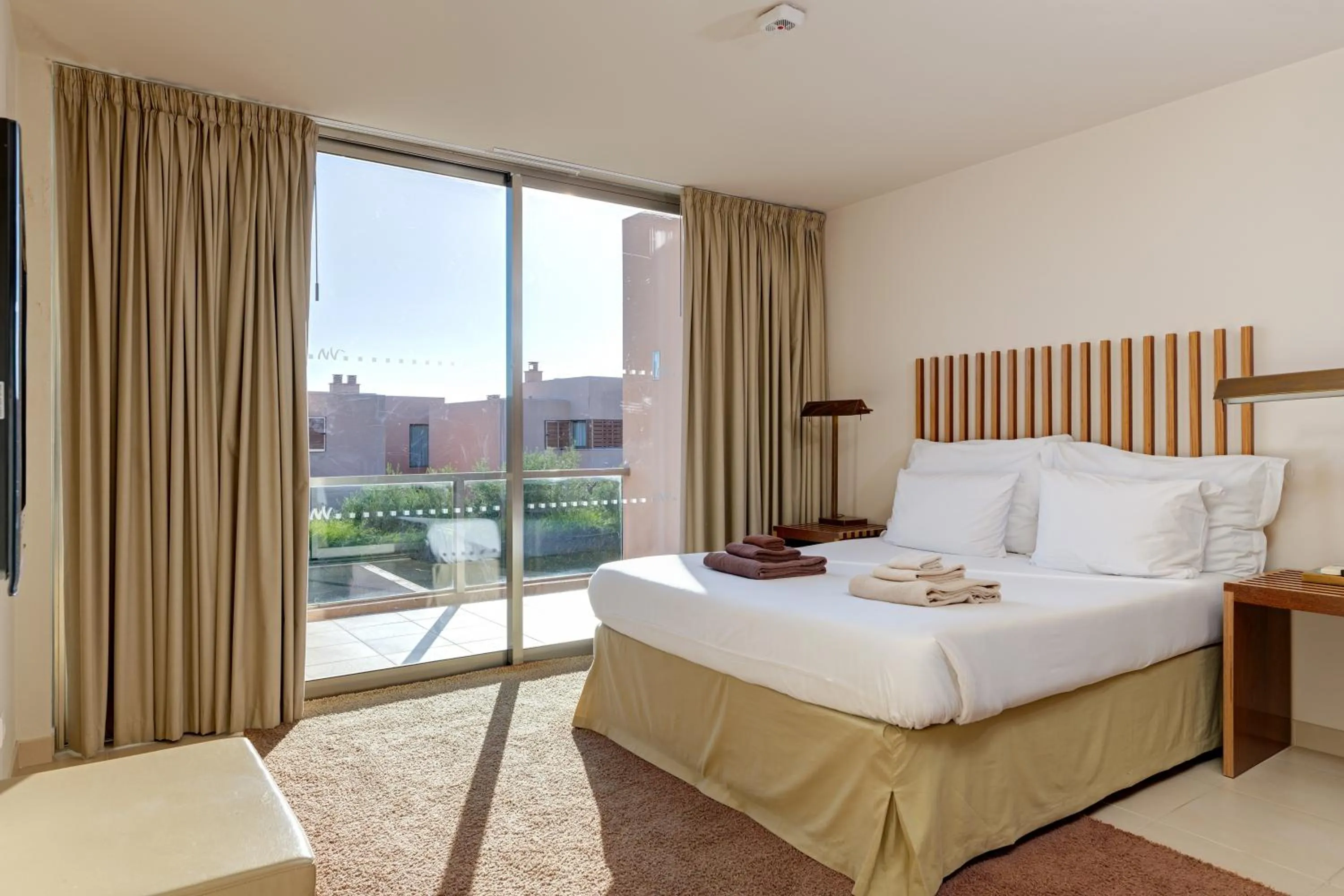 Bed in Salgados Beach Villas