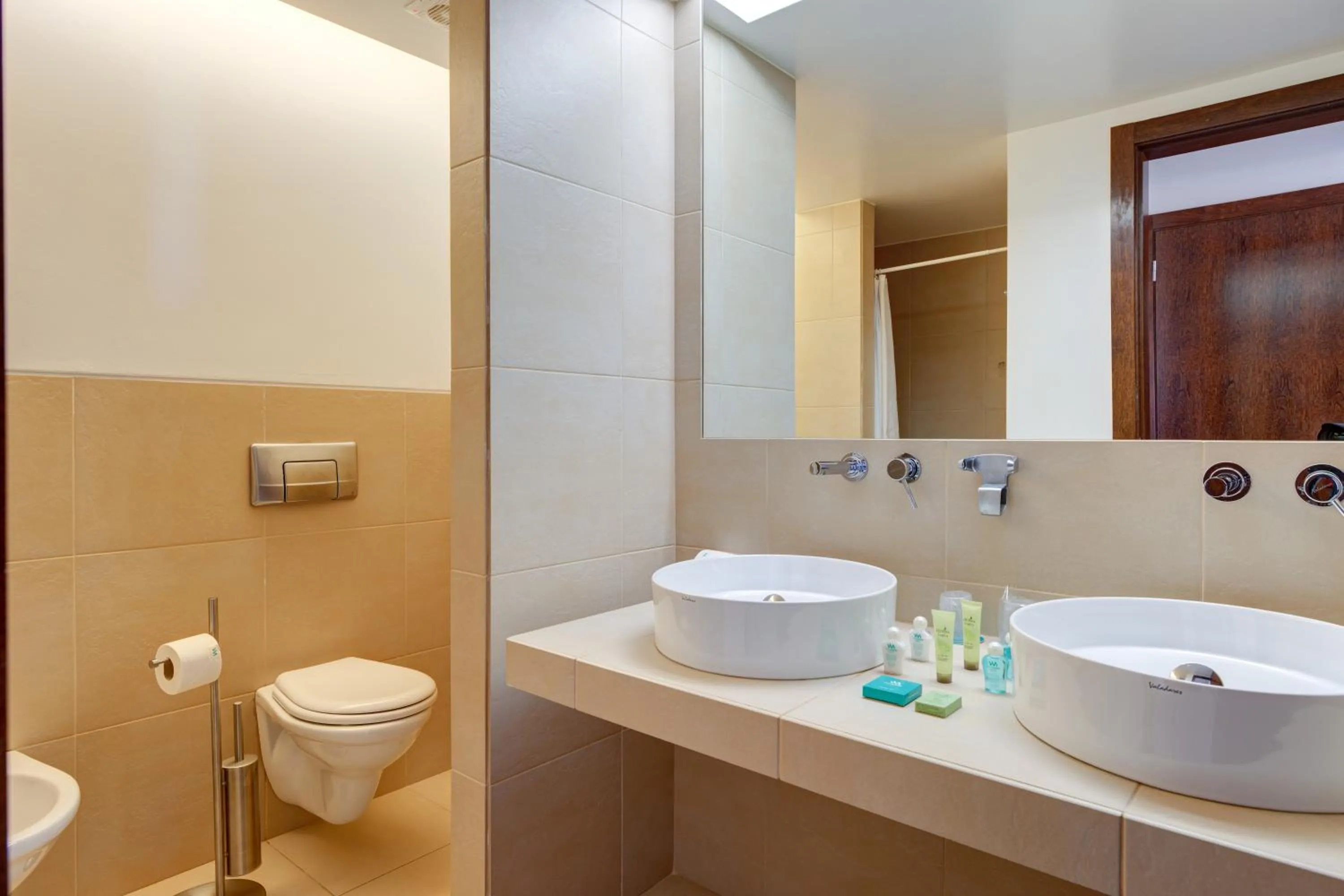 Toilet in Salgados Beach Villas