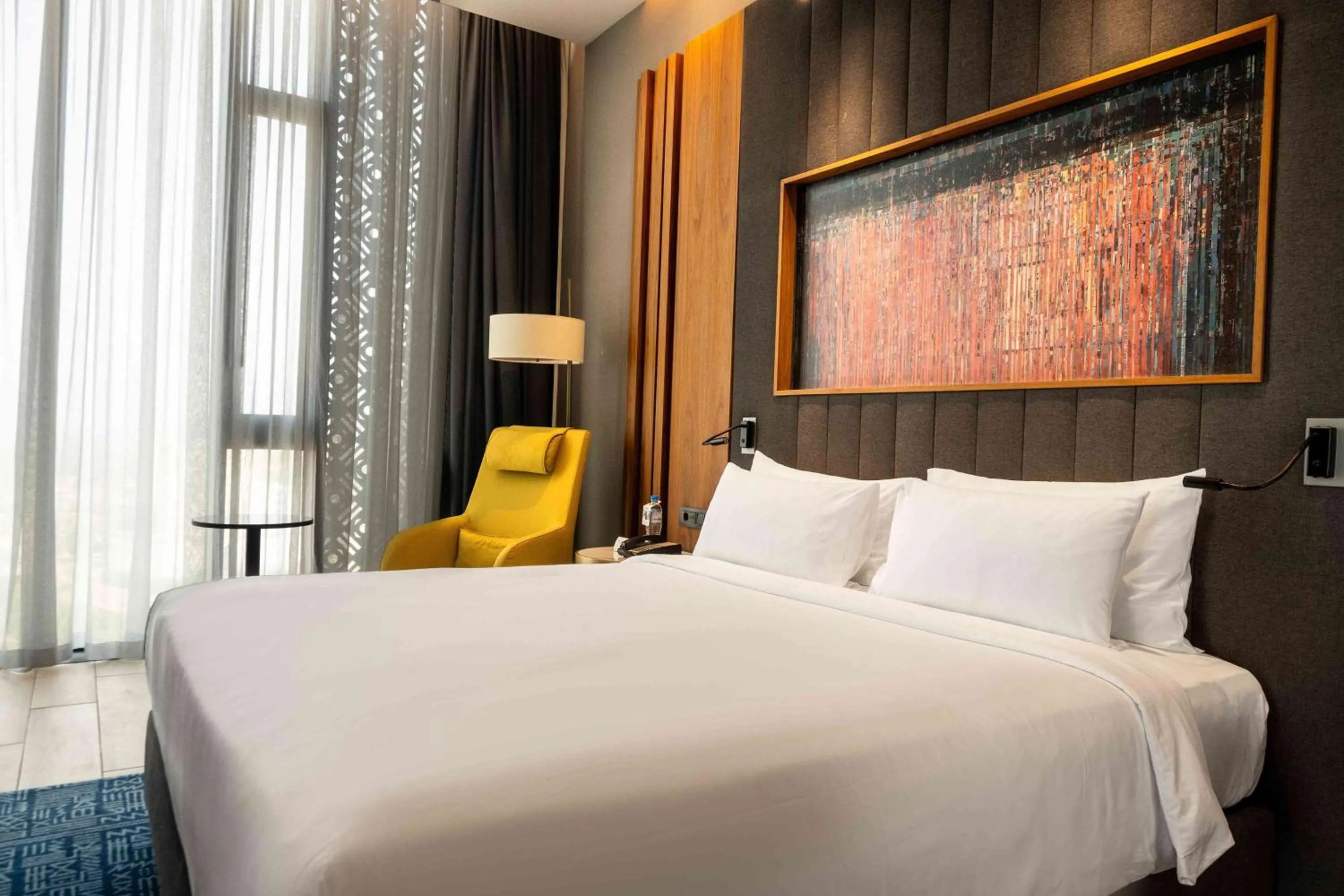 Photo of the whole room, Bed in Radisson Blu Hotel & Conference Center, Niamey