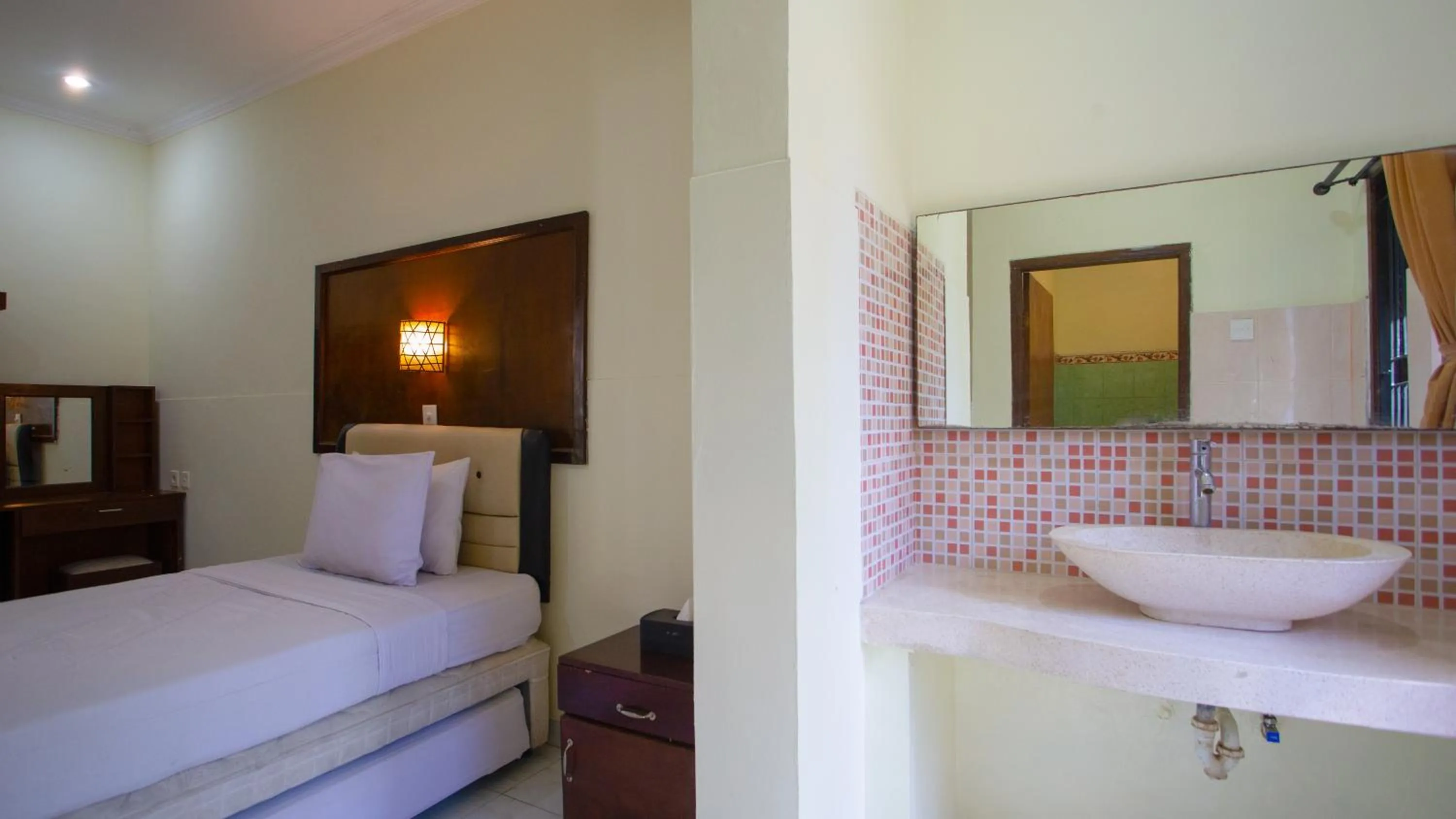 Bed in Teges Inn Kuta