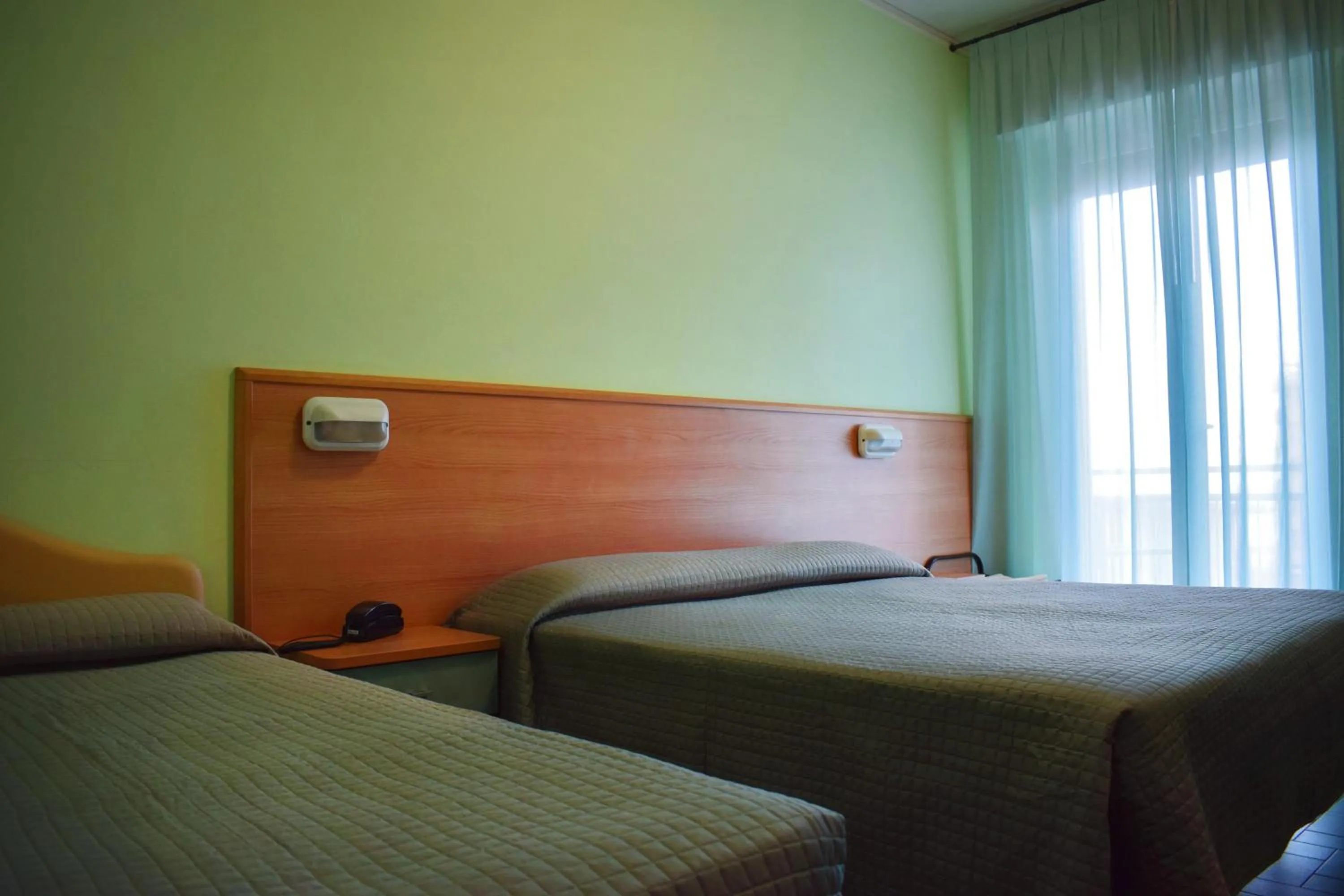 Bed in Hotel Martinez