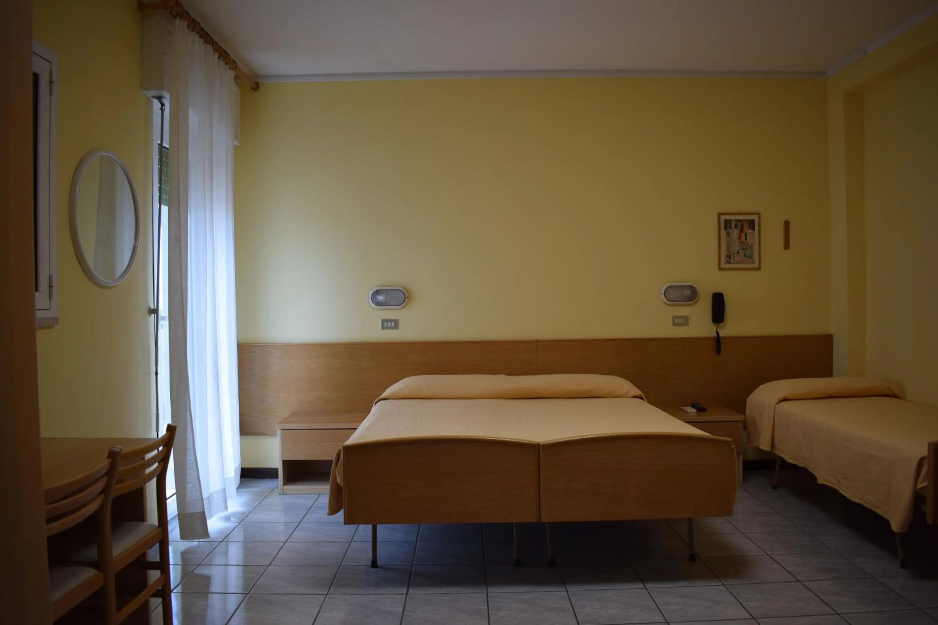 Bed in Hotel Martinez