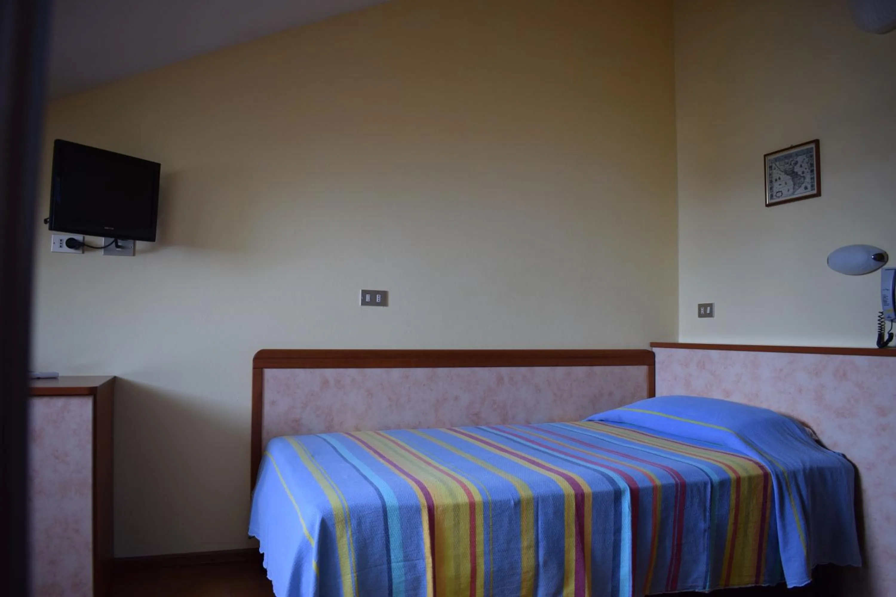 Bed in Hotel Martinez