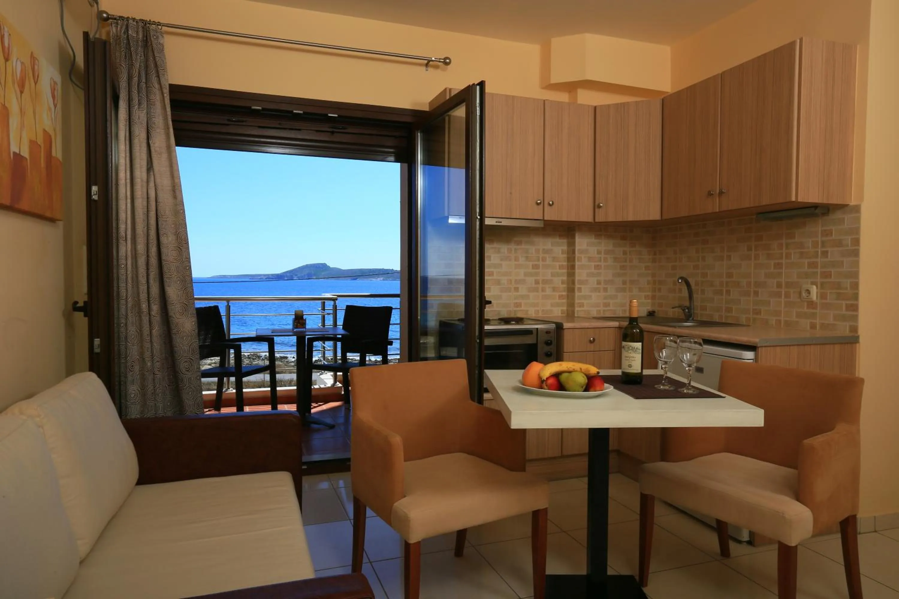 Kitchen or kitchenette in Faros Luxury Suites