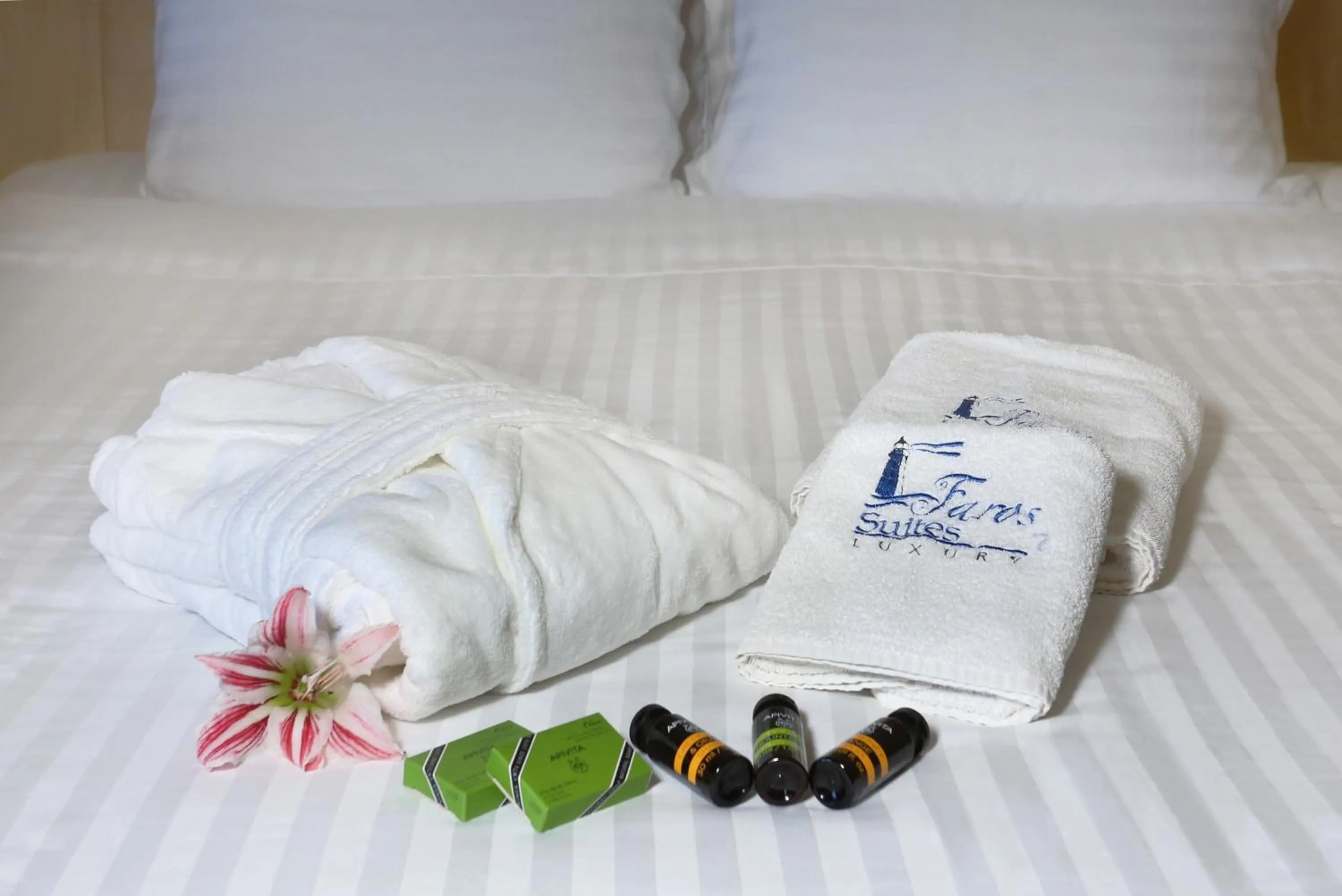 Bed in Faros Luxury Suites