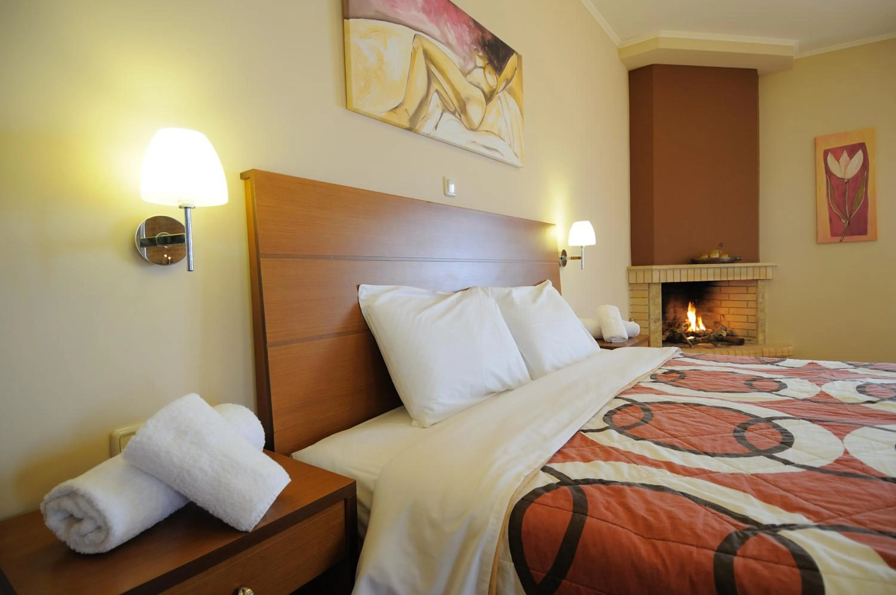 Bed in Faros Luxury Suites