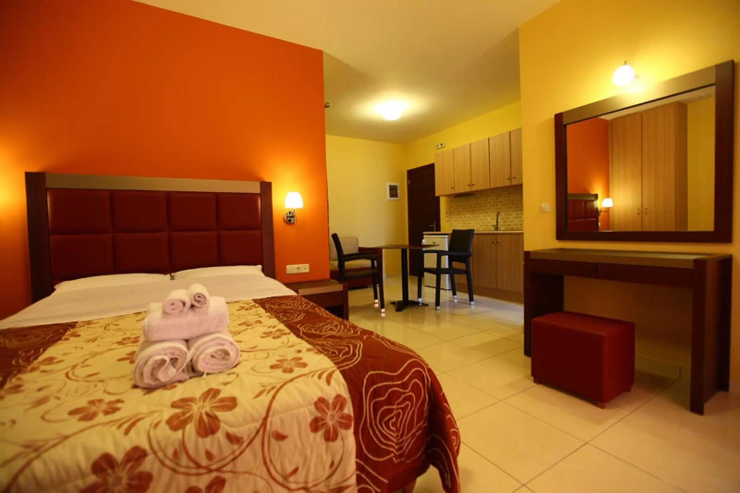 Bed in Faros Luxury Suites