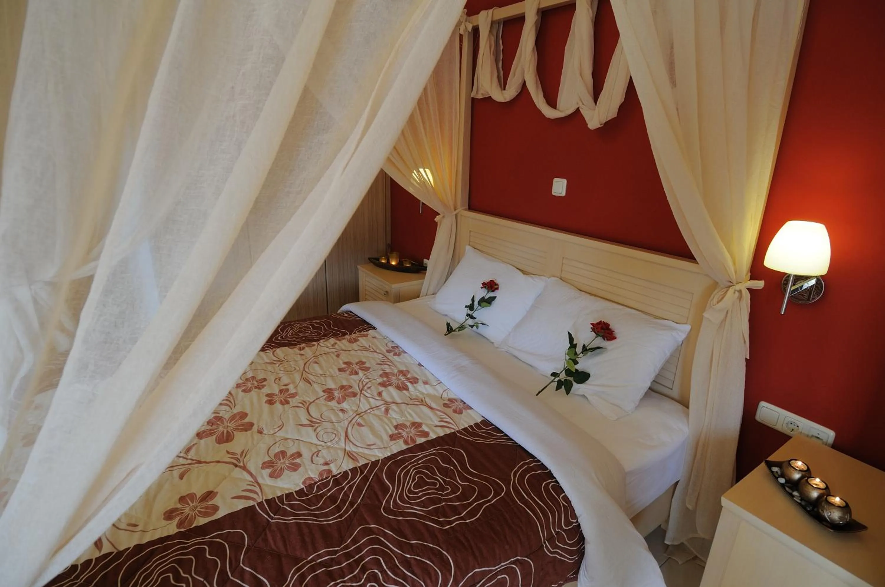 Bed in Faros Luxury Suites