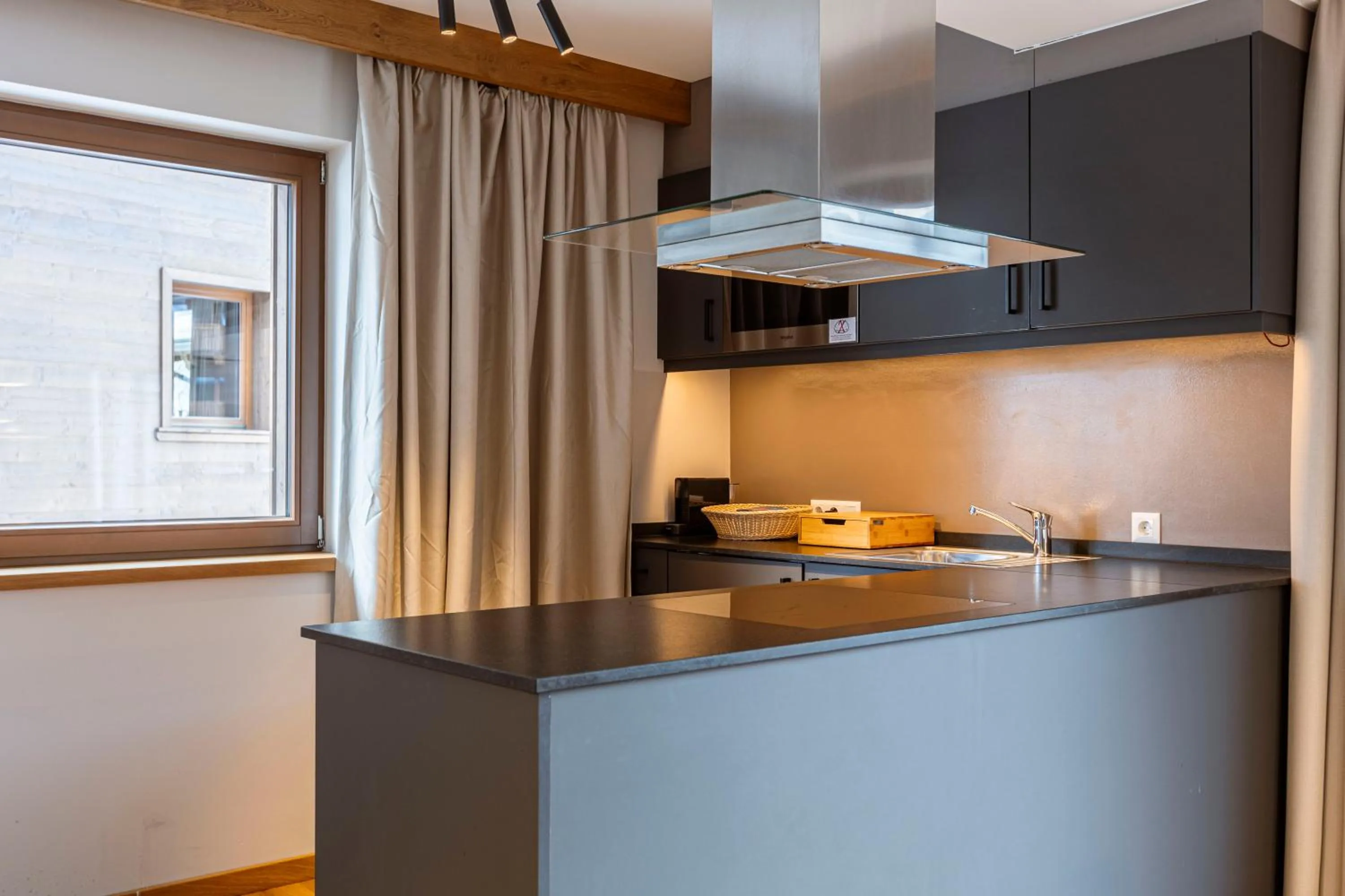 Kitchen or kitchenette in Bergresort Zugspitze Ehrwald by ALPS RESORTS