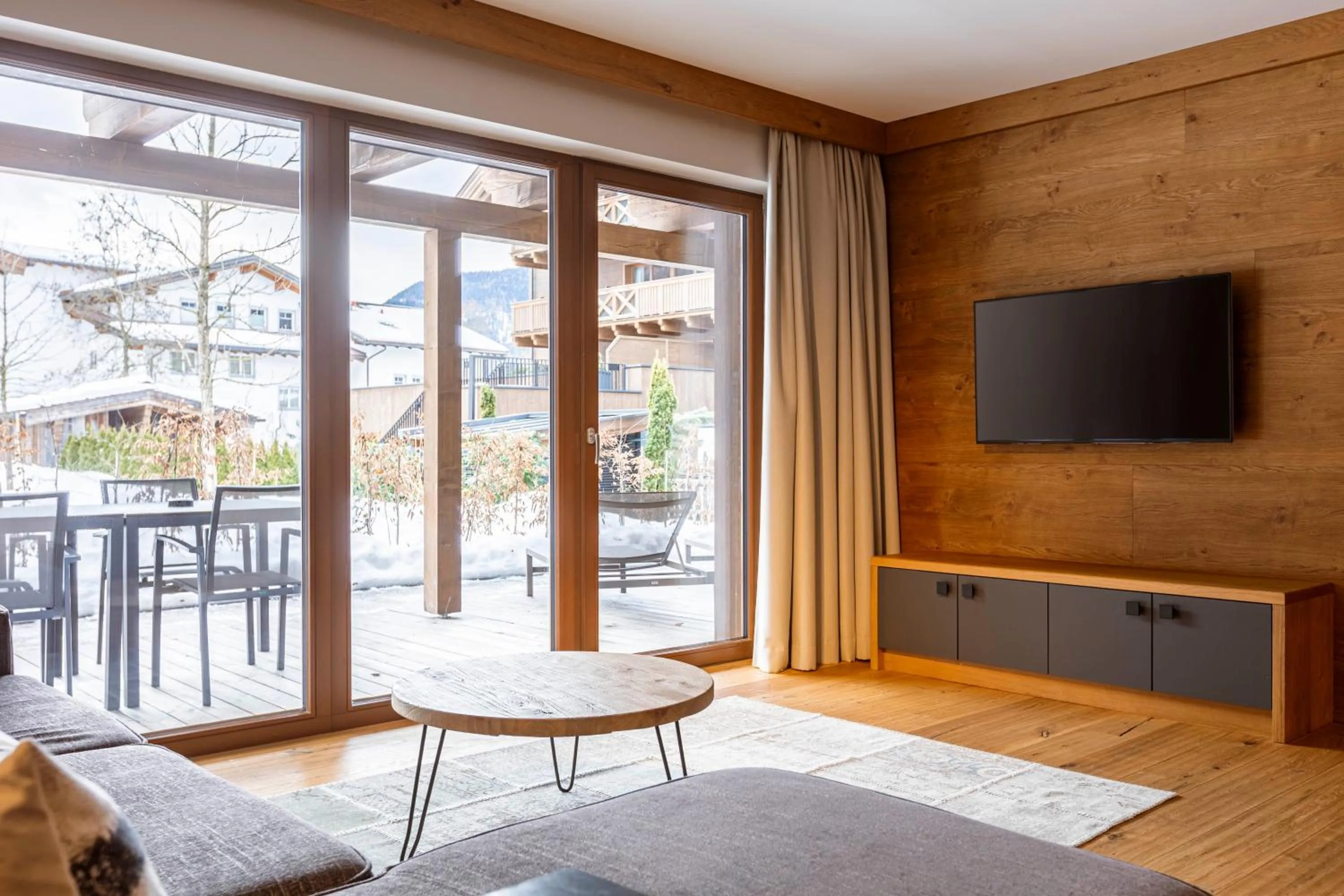 Living room in Bergresort Zugspitze Ehrwald by ALPS RESORTS