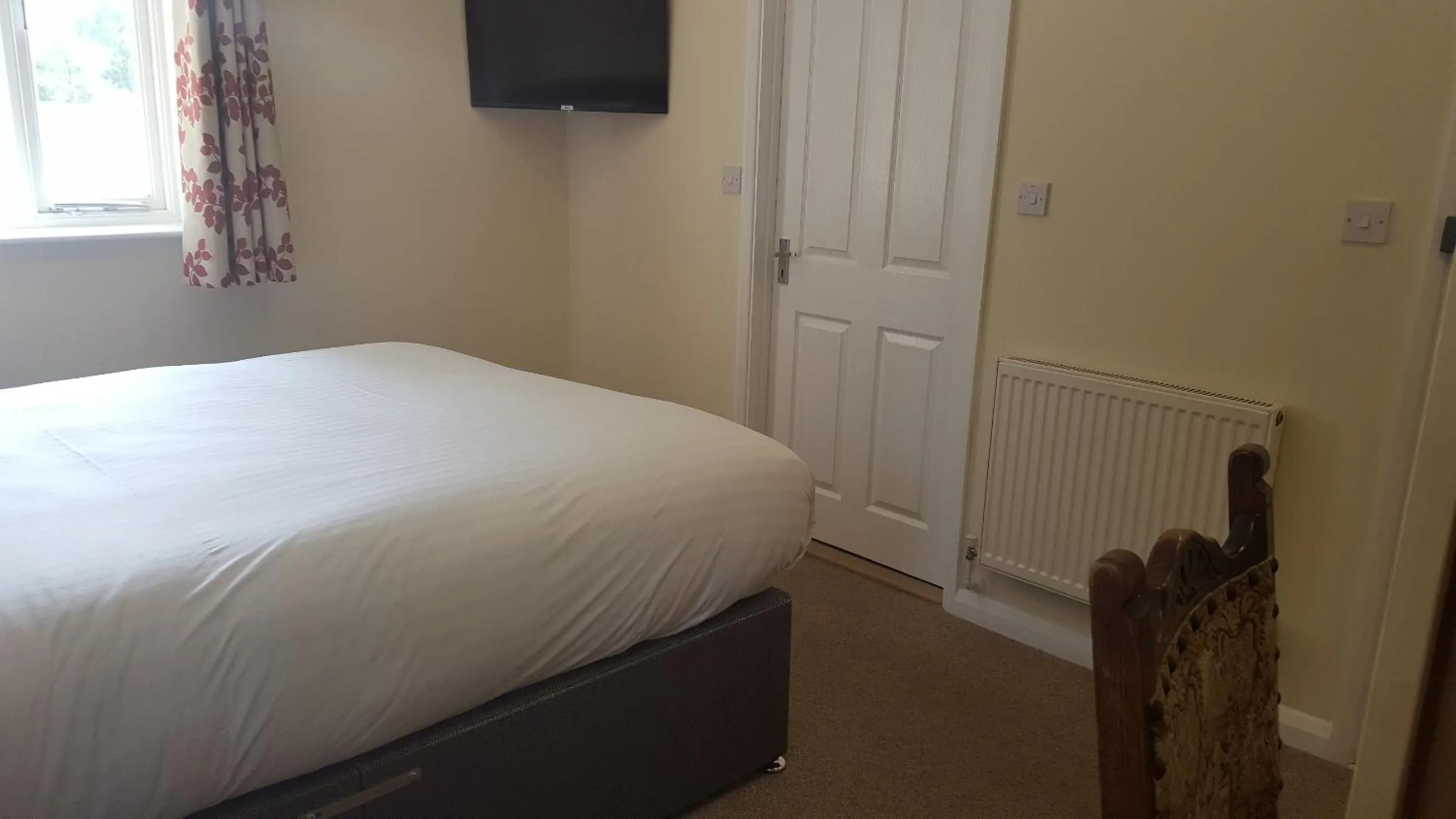 Bed in Oakside Lodge Guest House